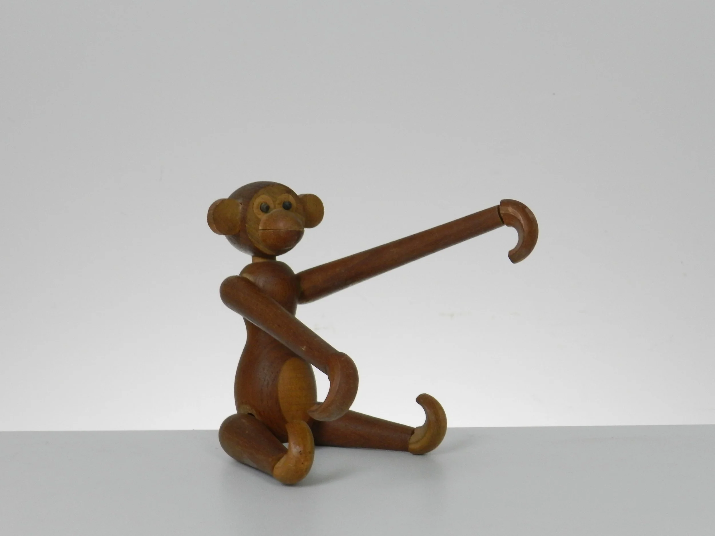 Vintage teak monkey in the style of Kay Bojesen.  circa 1960s.