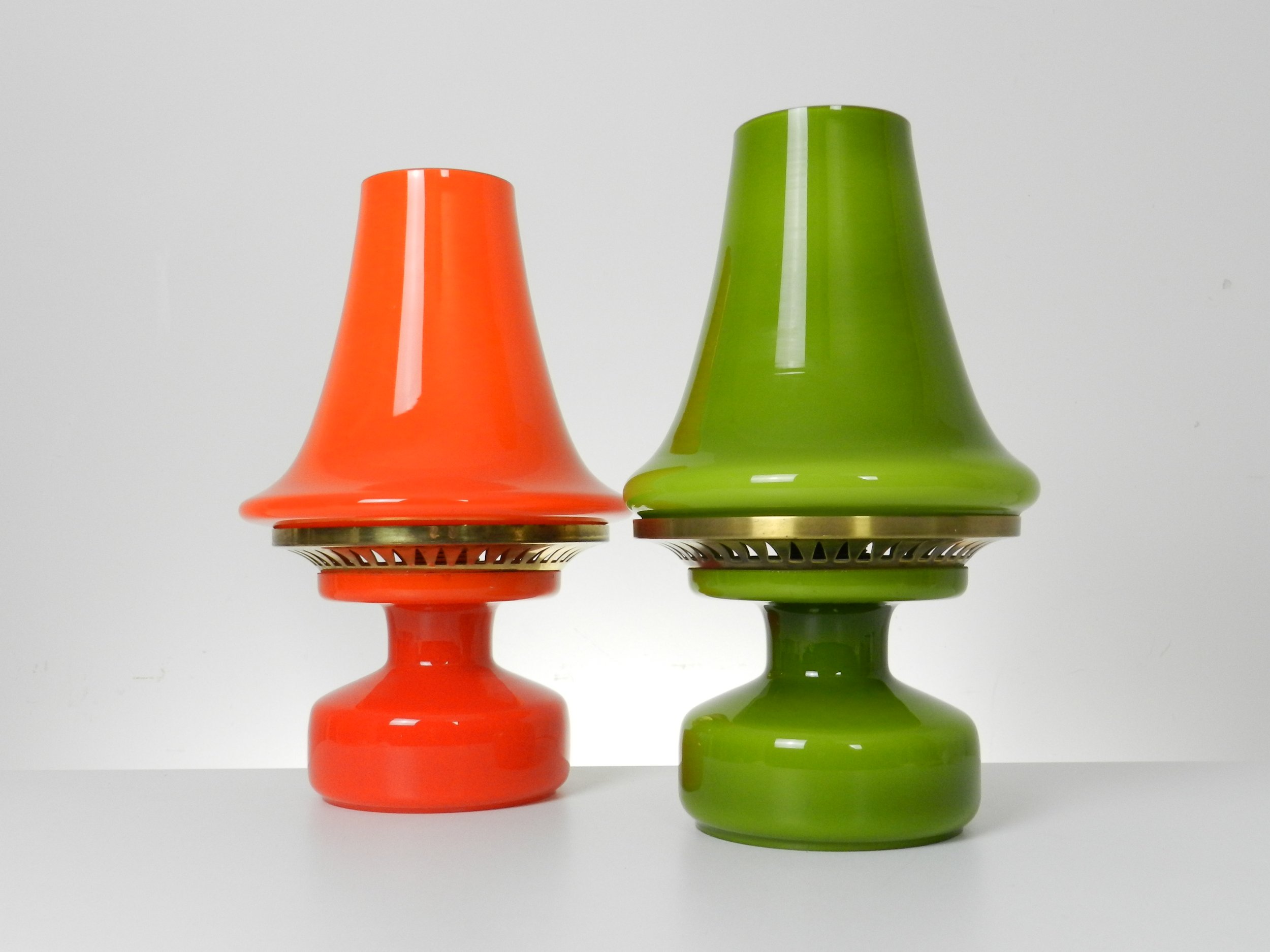 Cased glass and brass B 124 lamps designed by Hans-Agne Jakobsson.  Sweden, 1960s.