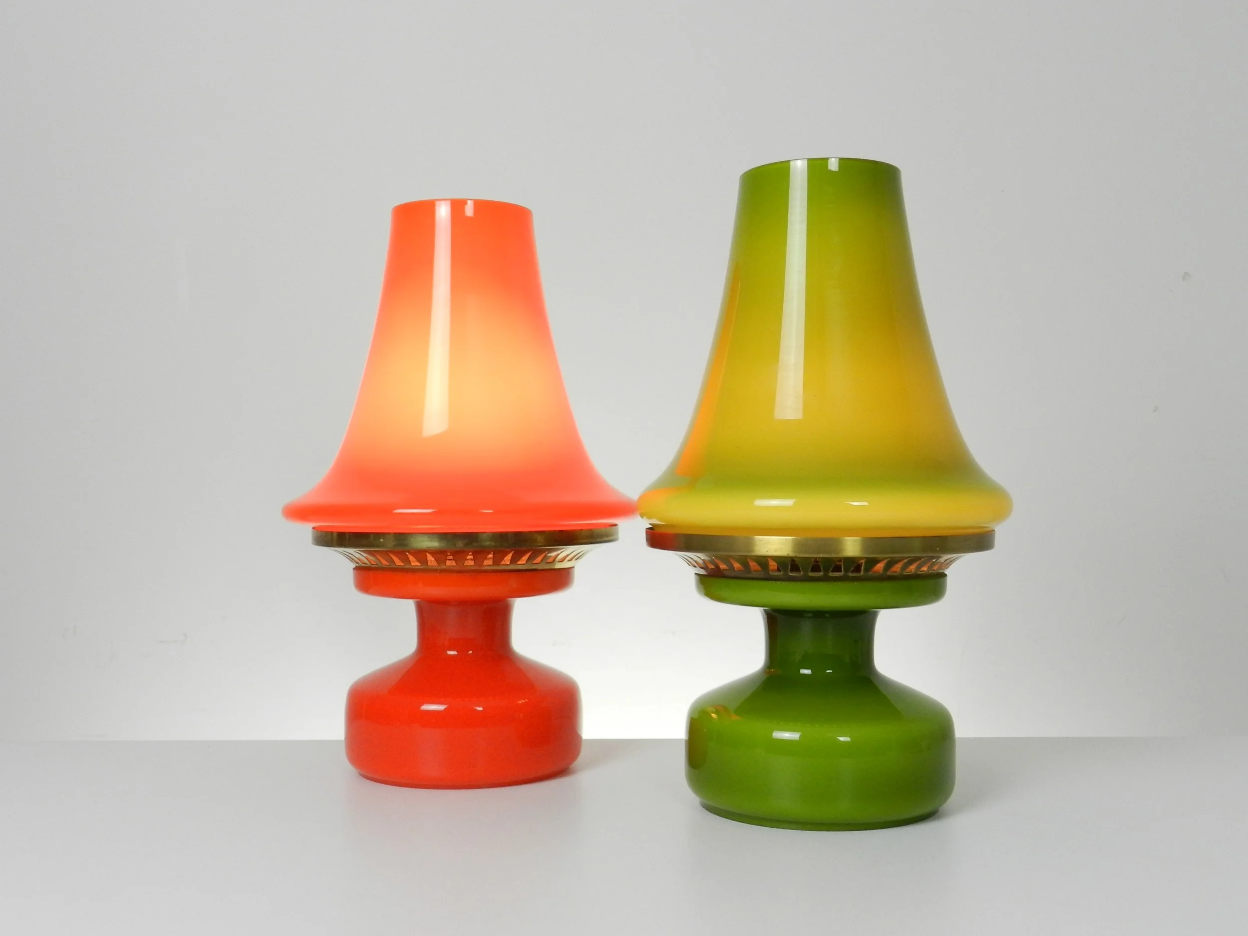 Cased glass and brass B 124 lamps designed by Hans-Agne Jakobsson.  Sweden, 1960s.