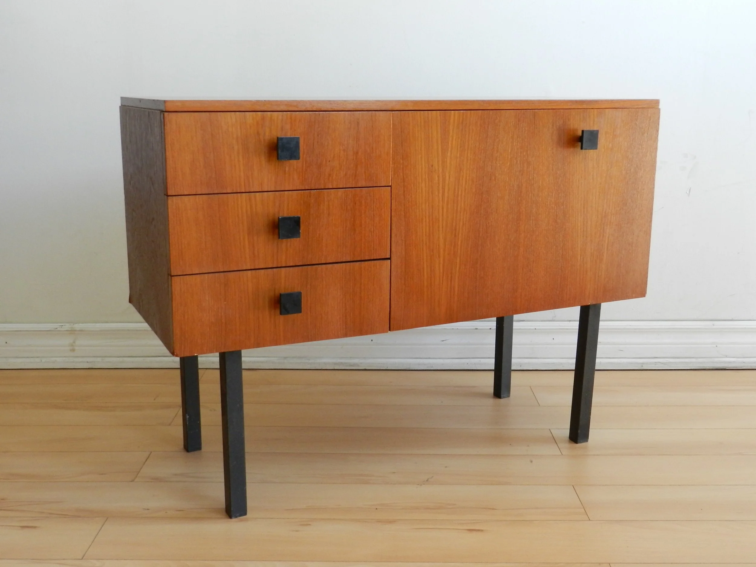 Teak entry or bar cabinet with metel legs and hardware.  Scandinavia, 1970s.