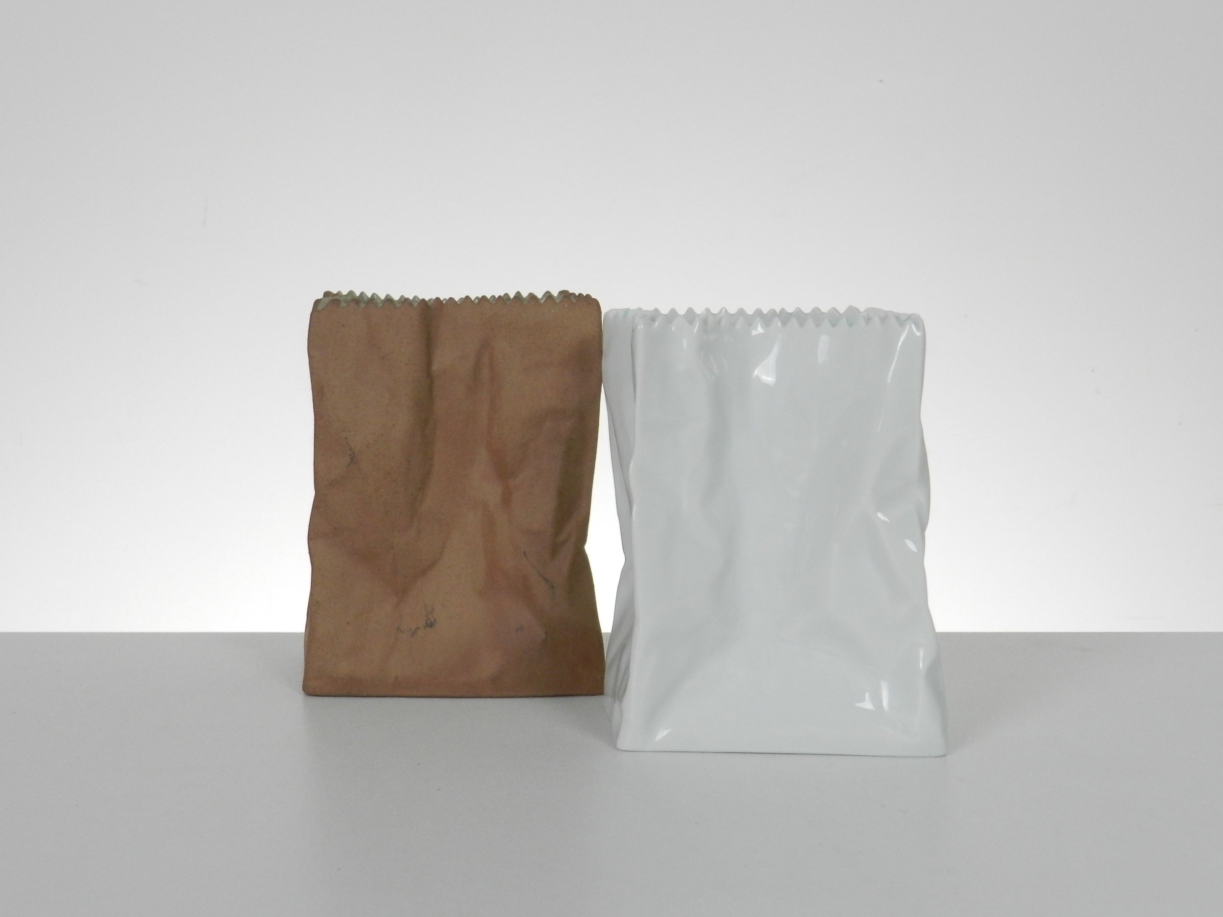 Small porcelain paper bag vases designed by Tapio Wirkkala for Rosenthal.  Germany, 1970s.