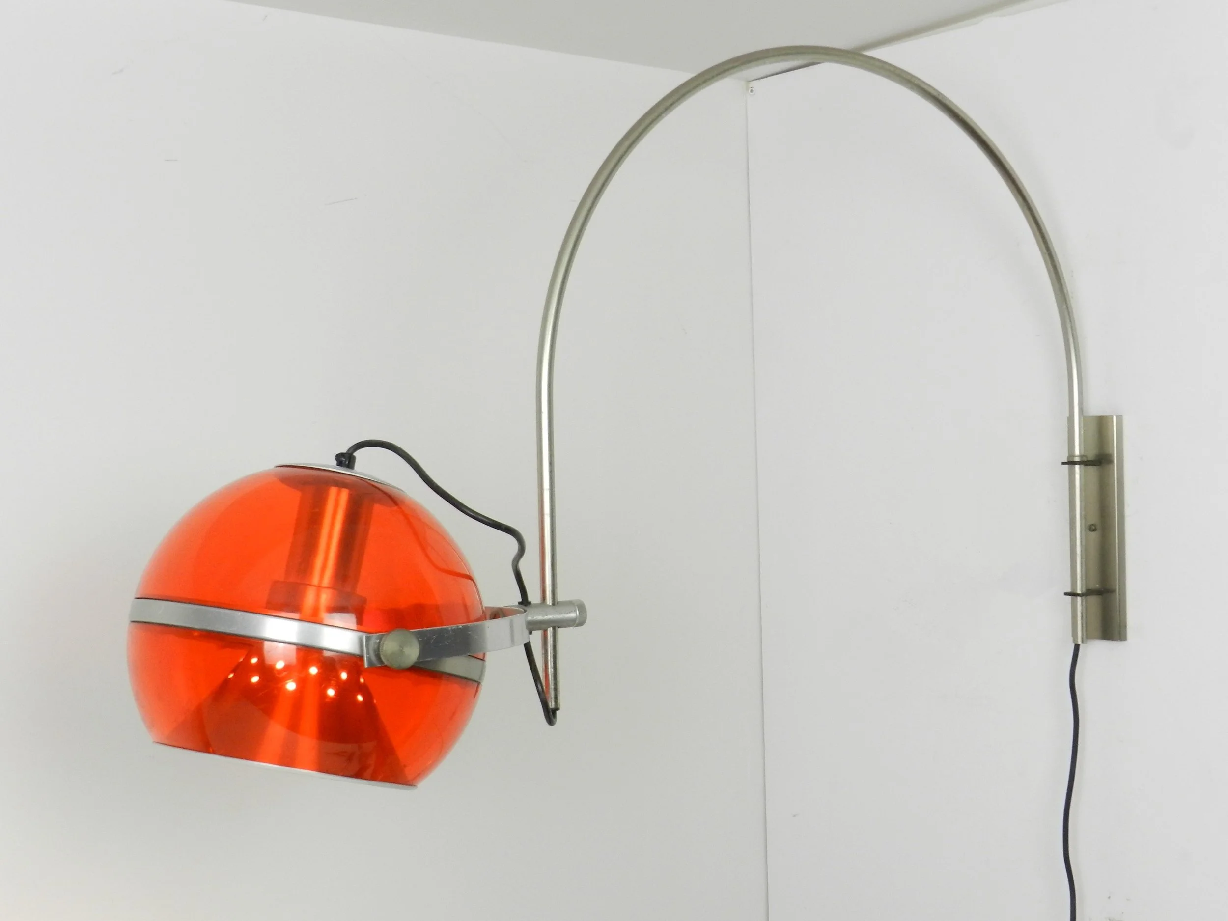 Space age arc wall lamp by Dijkstra.  Netherlands, 1970s