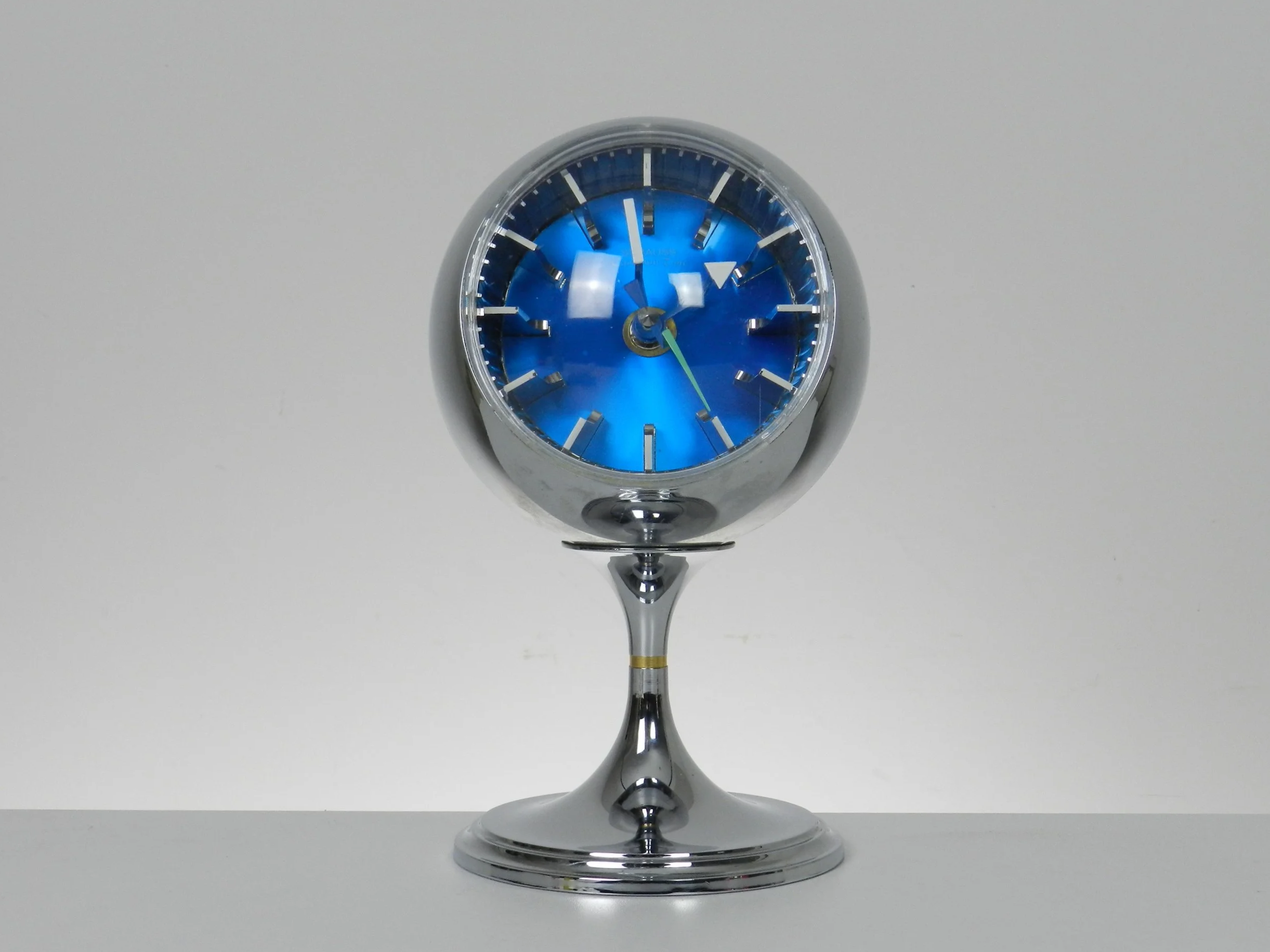 Space age pedestal clock in chrome by Strauss.  Japan, 1970s.