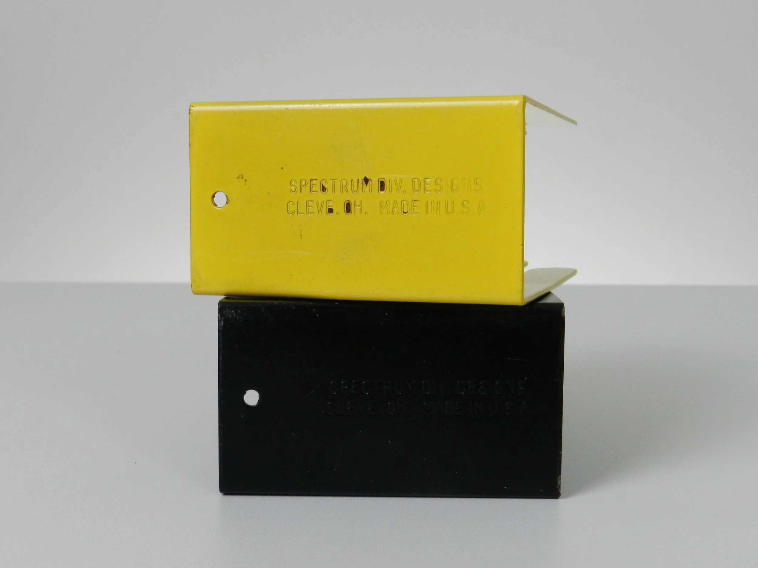 Pop art napkin holders in enameled metal by Spectrum Div. Designs.  USA, 1970s.