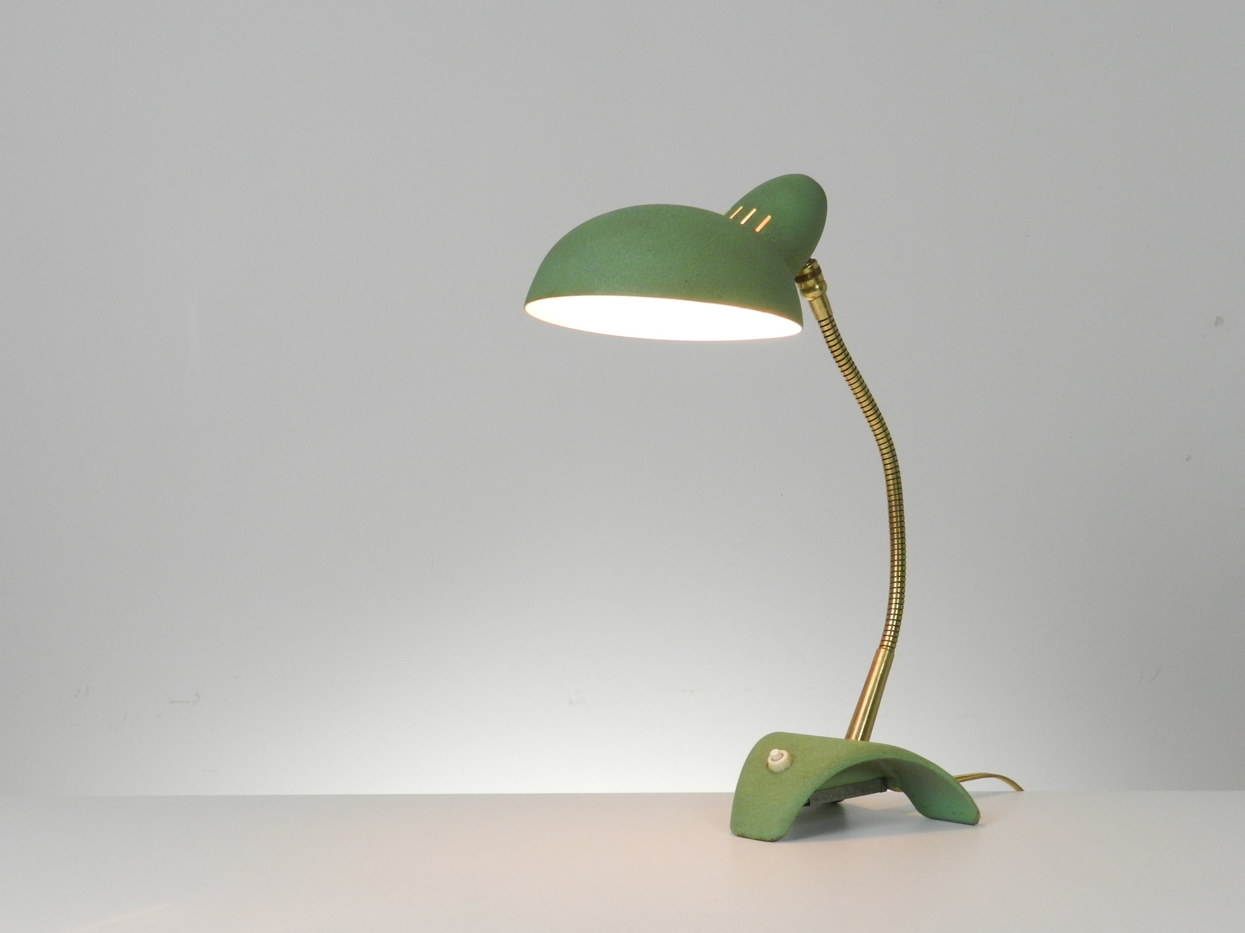Mid century modern desk lamp in enameled metal and brass.  France, 1960s.