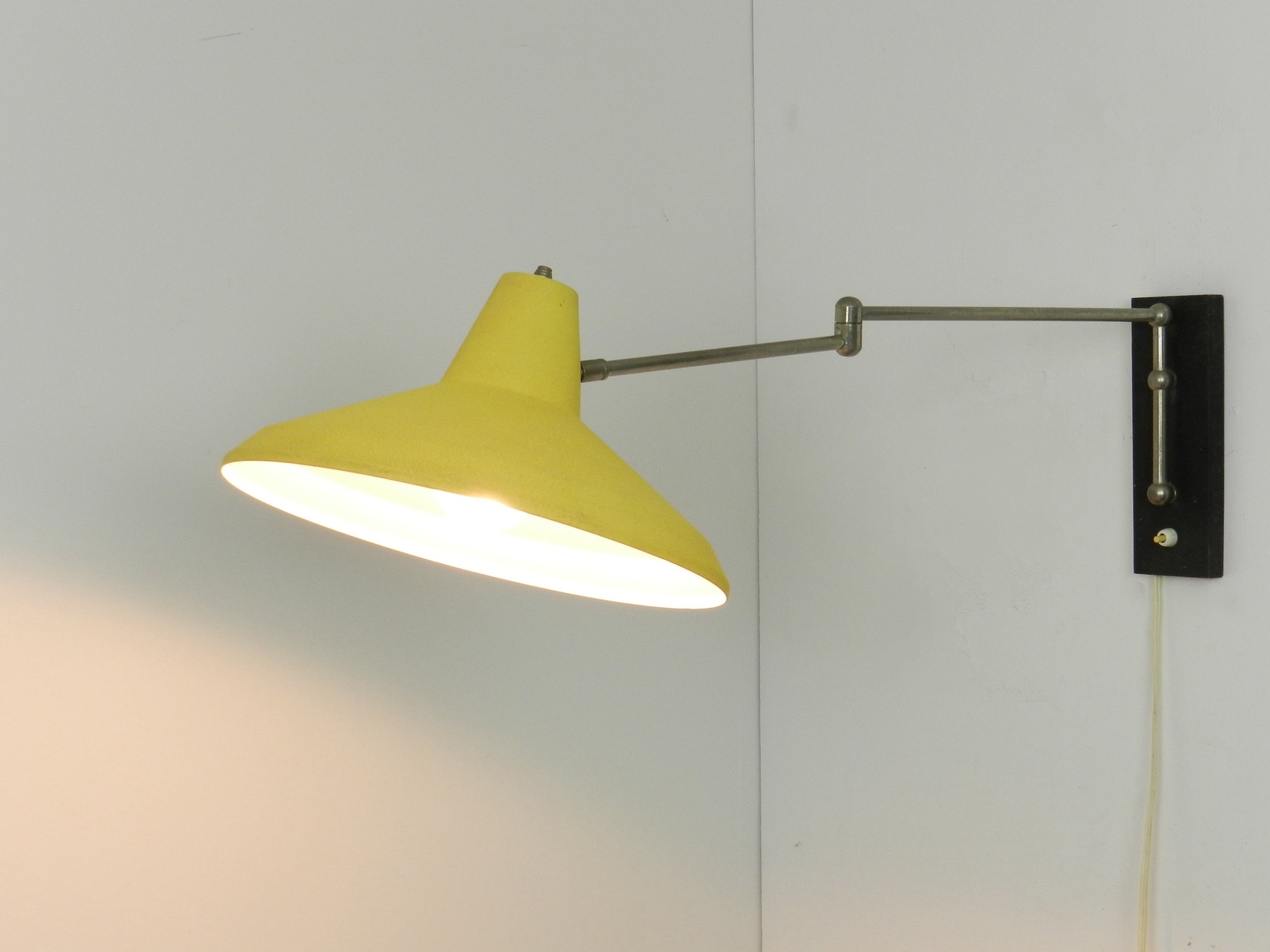 Mid century articulating wall lamp, possibly by Philips.  Netherlands, 1960s.