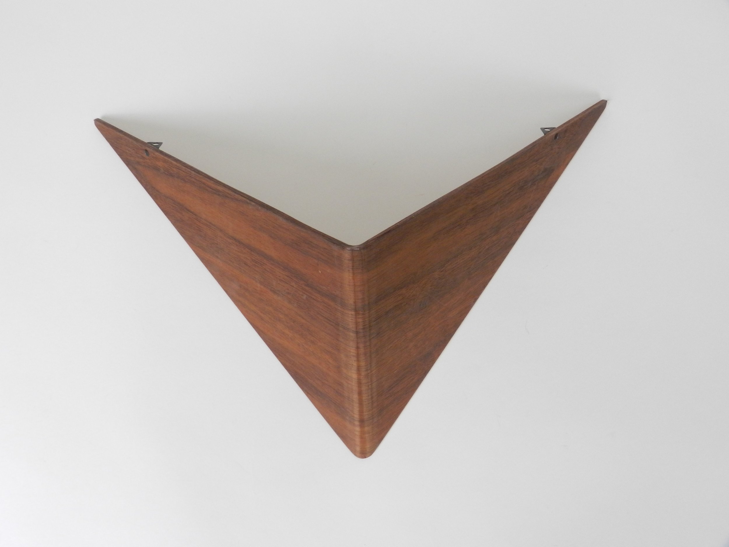 Wall shelf in bent plywood with teak veneer, designed by Poul Cadovius.  Denmark, 1960s.