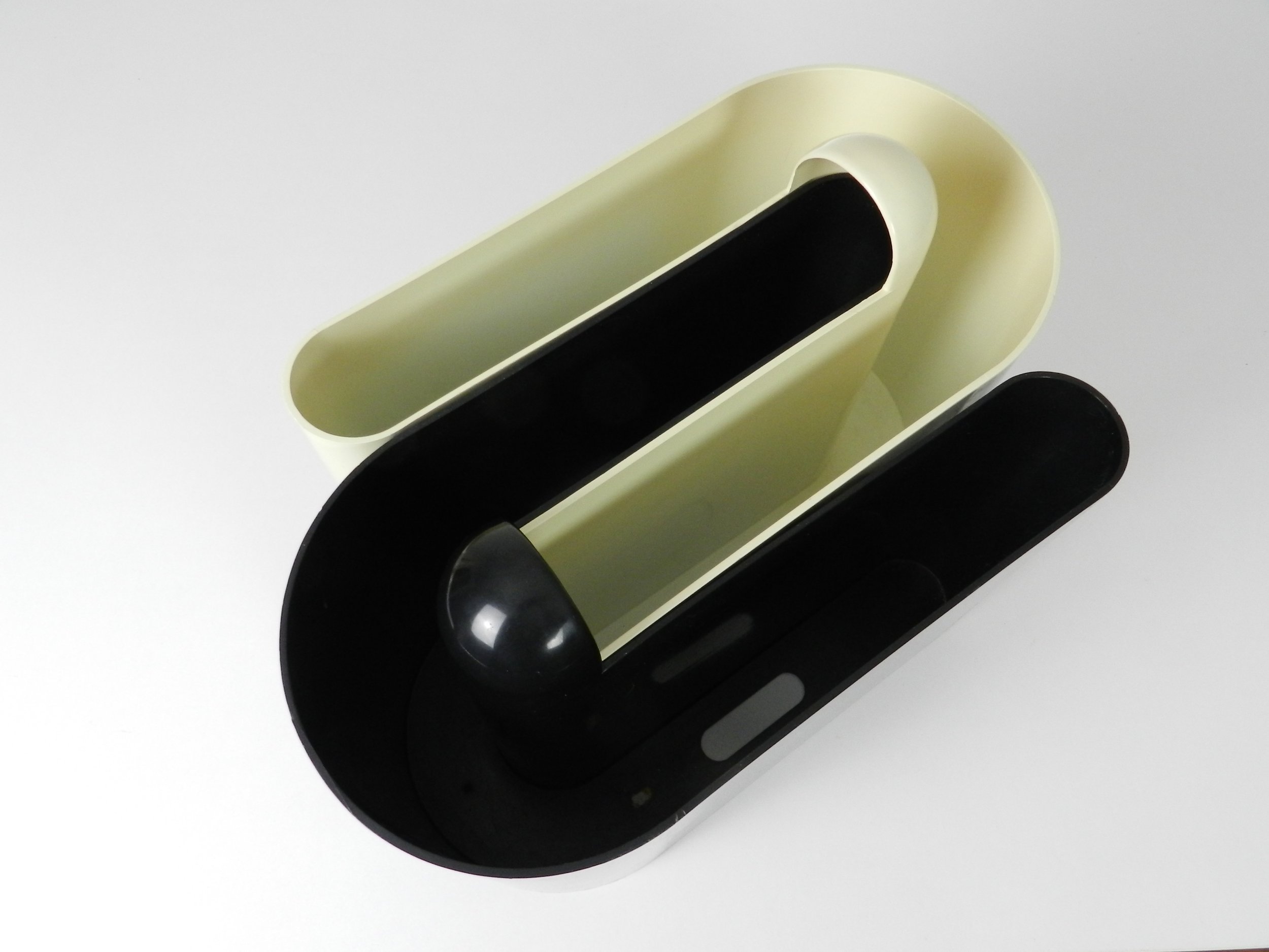 Pair of nesting plastic magazine racks designed by Rodolfo Bonetto for Vastill.  Italian design, manufactured in Canada, 1960s.