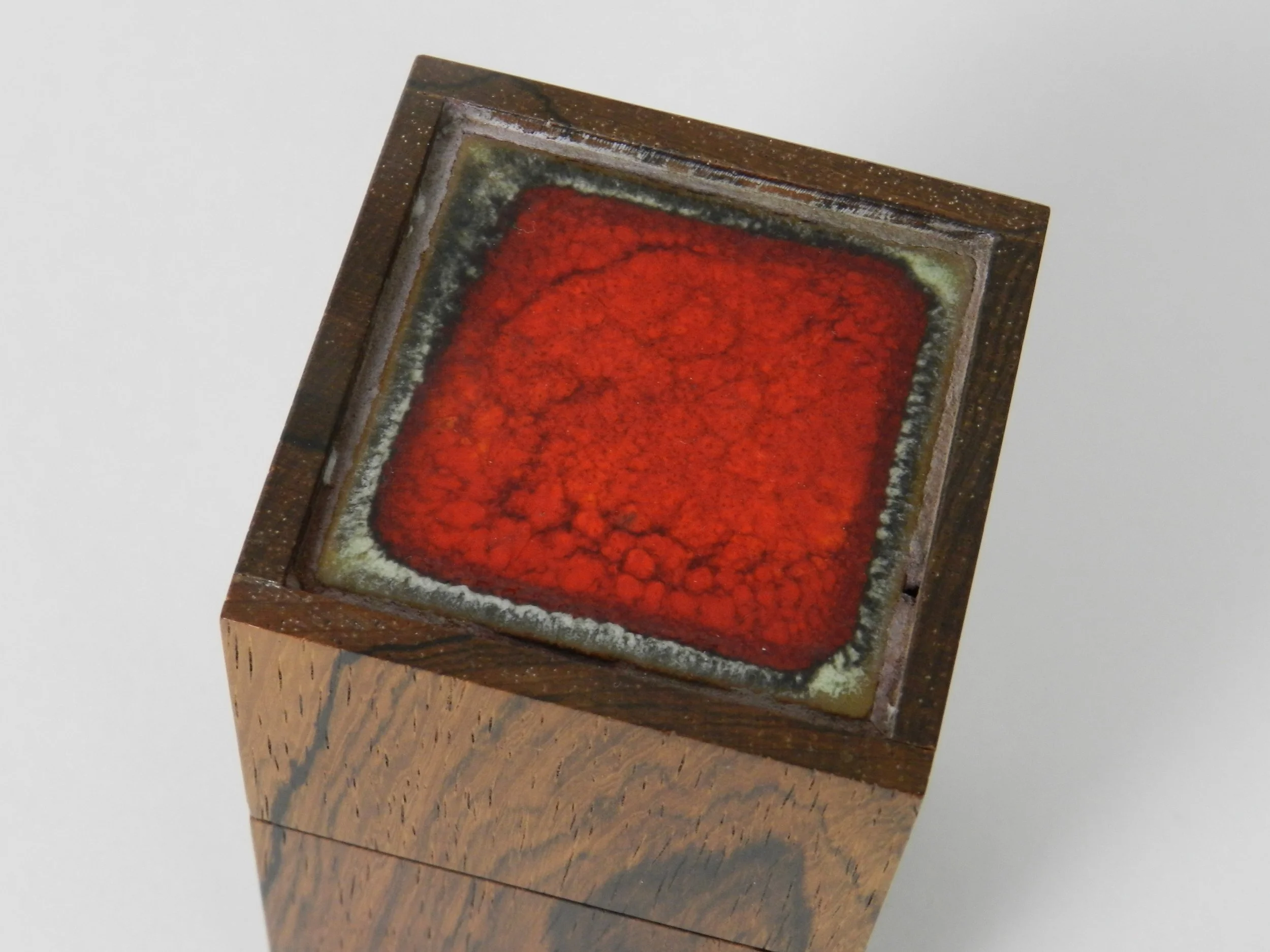 Rosewood box with enamel tile designed by Alfred Klitgaard.  Denmark, 1960s.