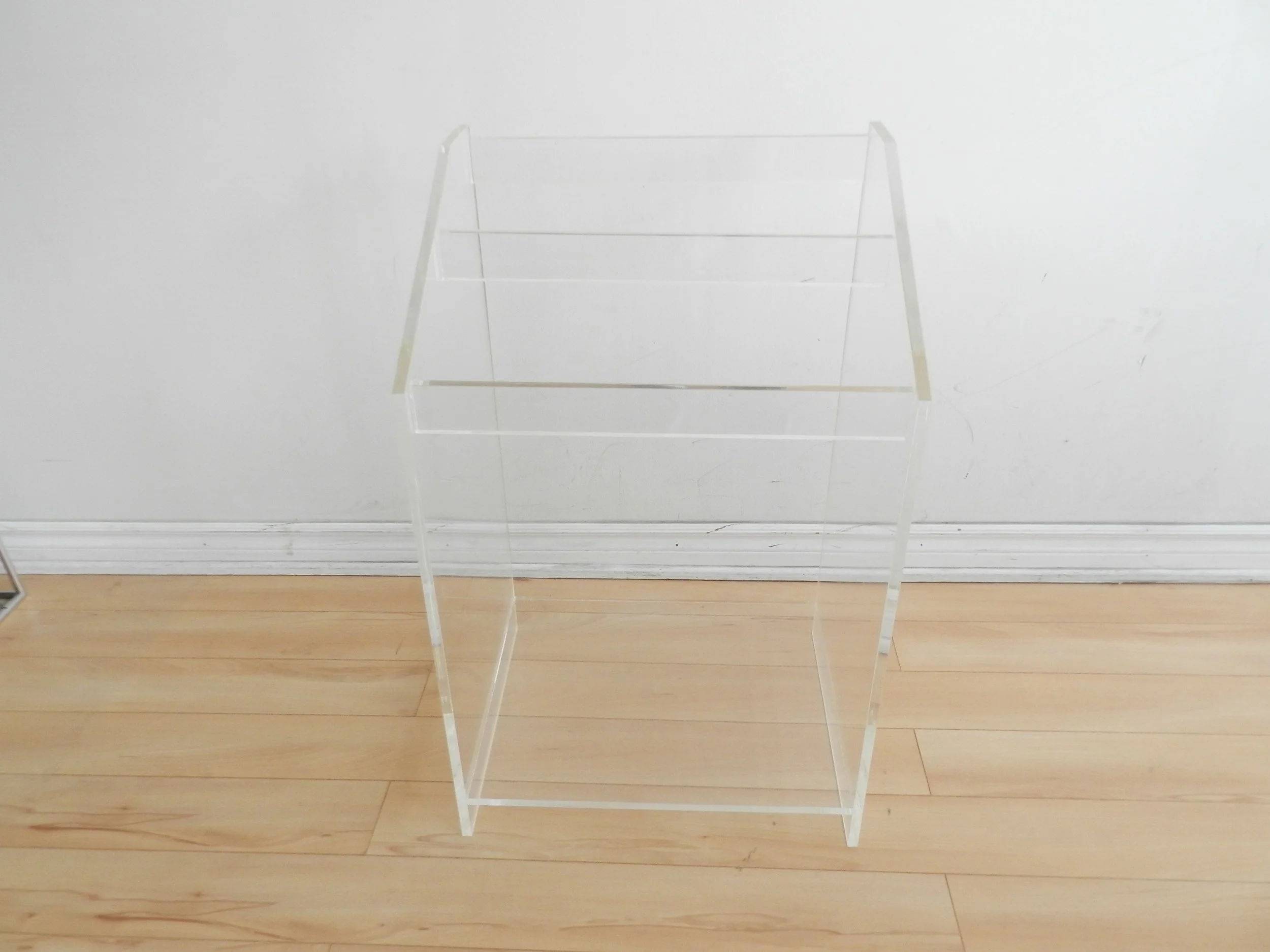 Freestanding towel/blanket rack in lucite.  circa 1980s.