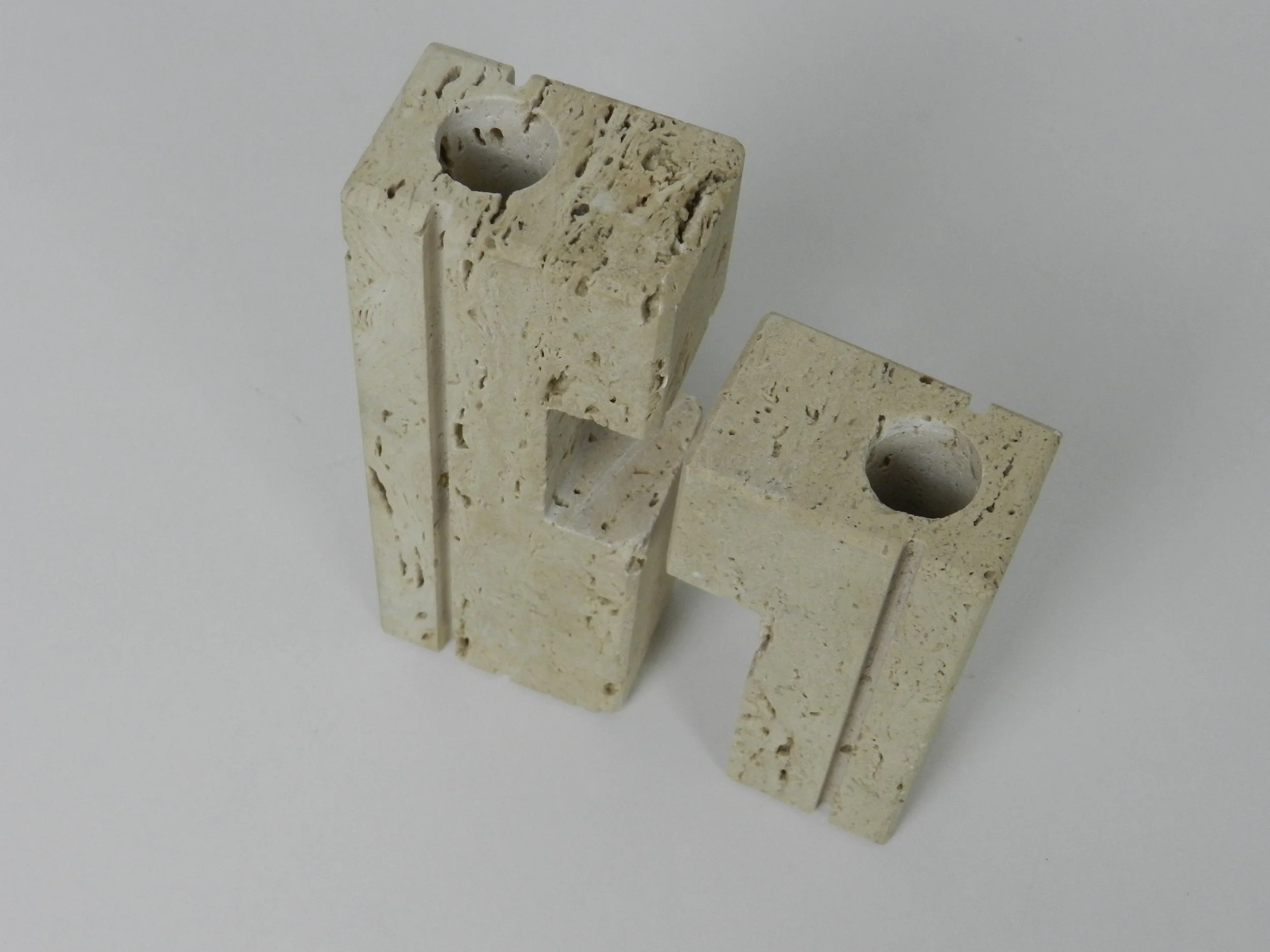 Travertine nesting candle holders designed by Fratelli Manelli.  Italy, 1960s.