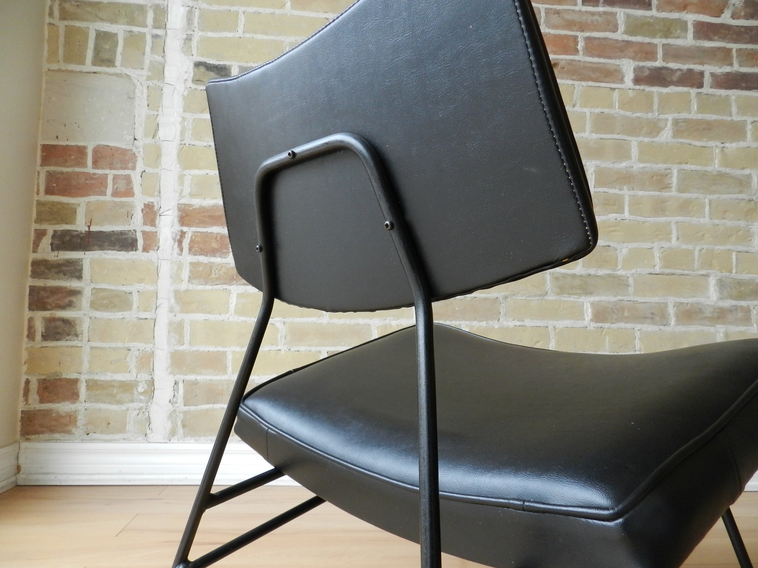 Pair of rare Canadian design Video Chairs by Arrow Bedding. Wrought iron and bent plywood with vinyl upholstery.  Canada, 1950s.