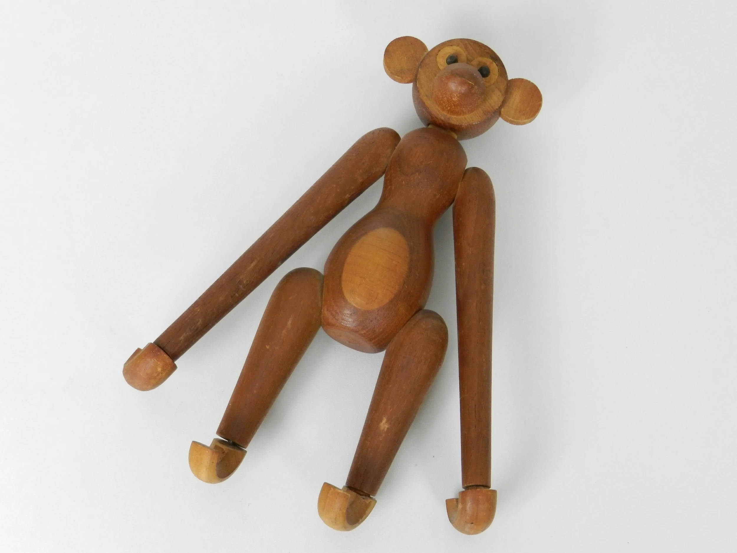 Vintage teak monkey in the style of Kay Bojesen.  circa 1960s.