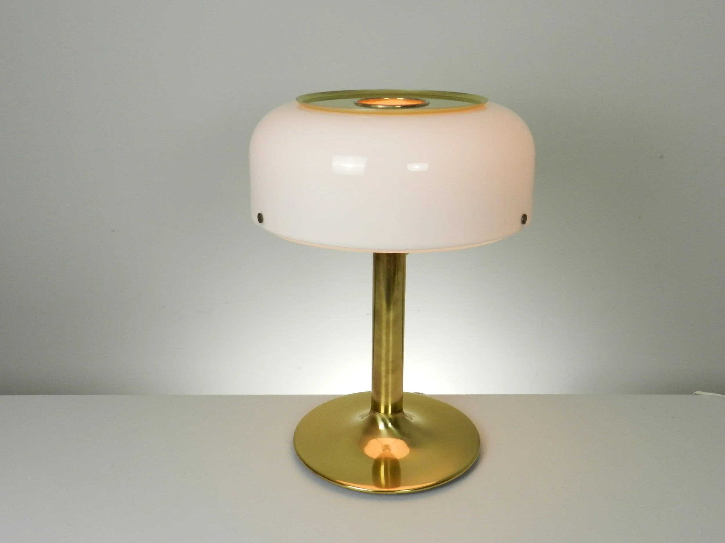 Modernist Knubbling table lamp in brass with plastic shade. Designed by Anders Pehrson for Atelje Lyktan.  Sweden, 1970s.
