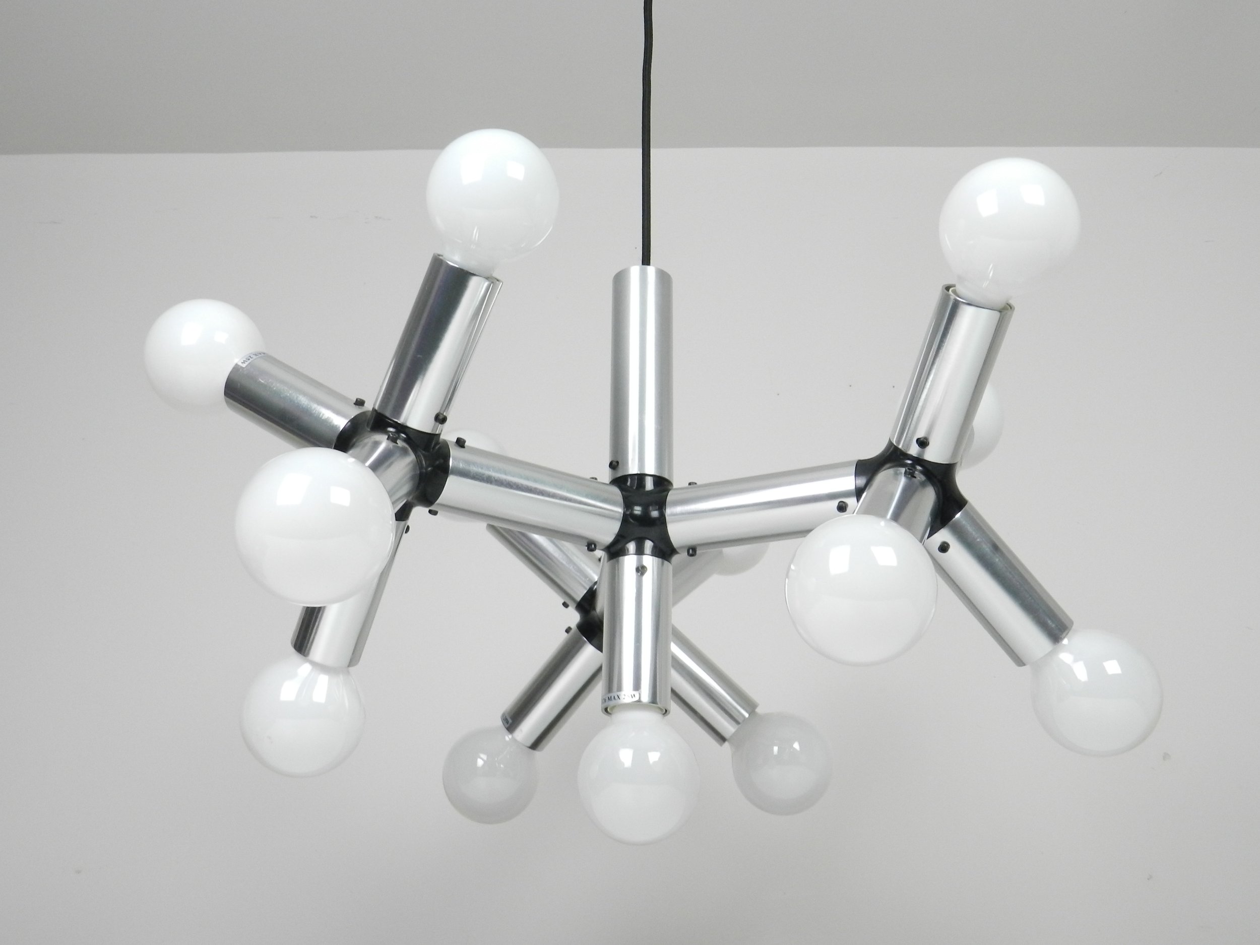 Chandelier in alumunum and plastic designed by Robert Haussmann for Swiss Lamps International.  Switzerland, 1960s.