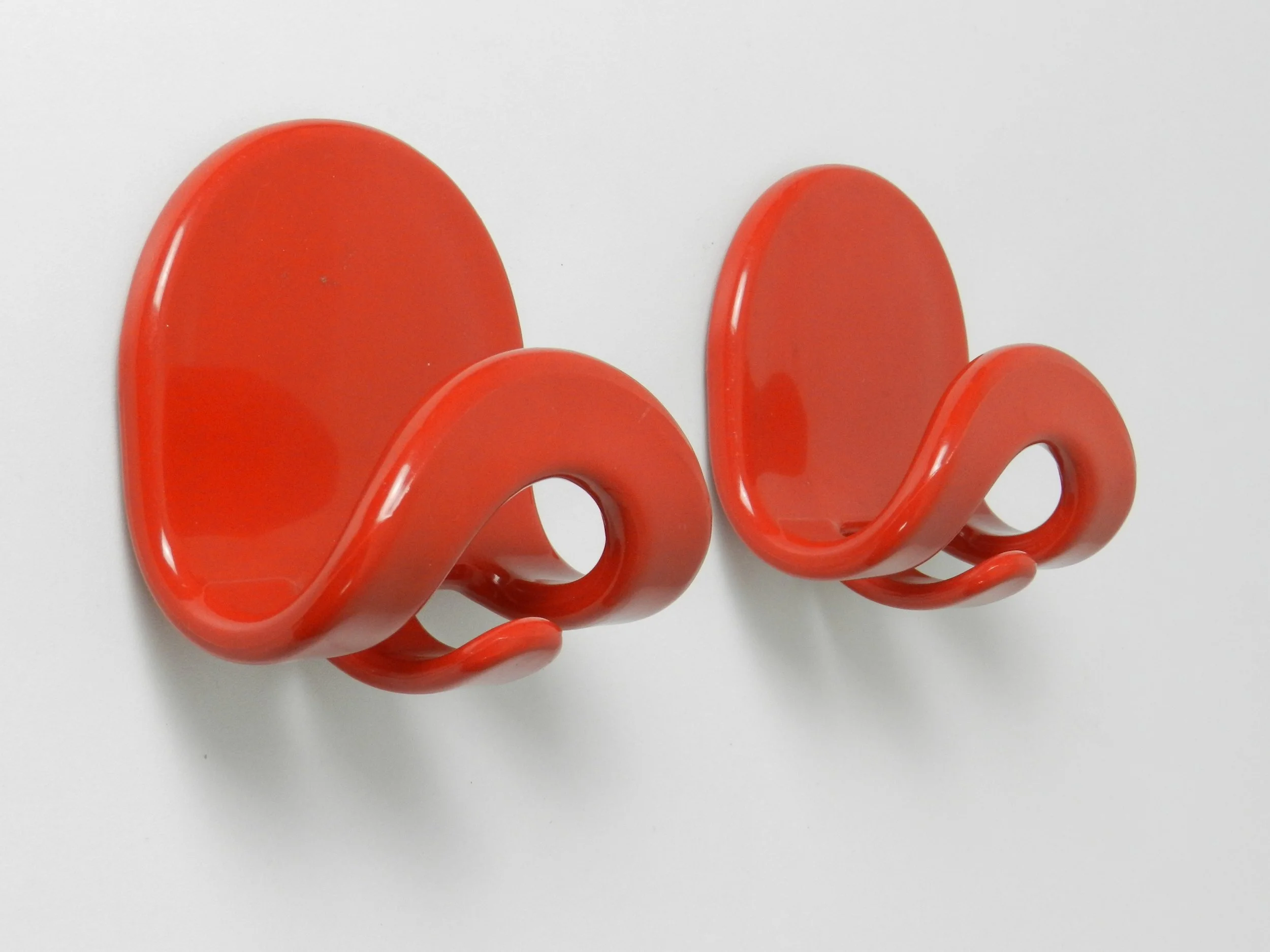 Pair of plastic coat hooks designed by Carlo Bartoli for Con and Con.  Italy, 1970s.