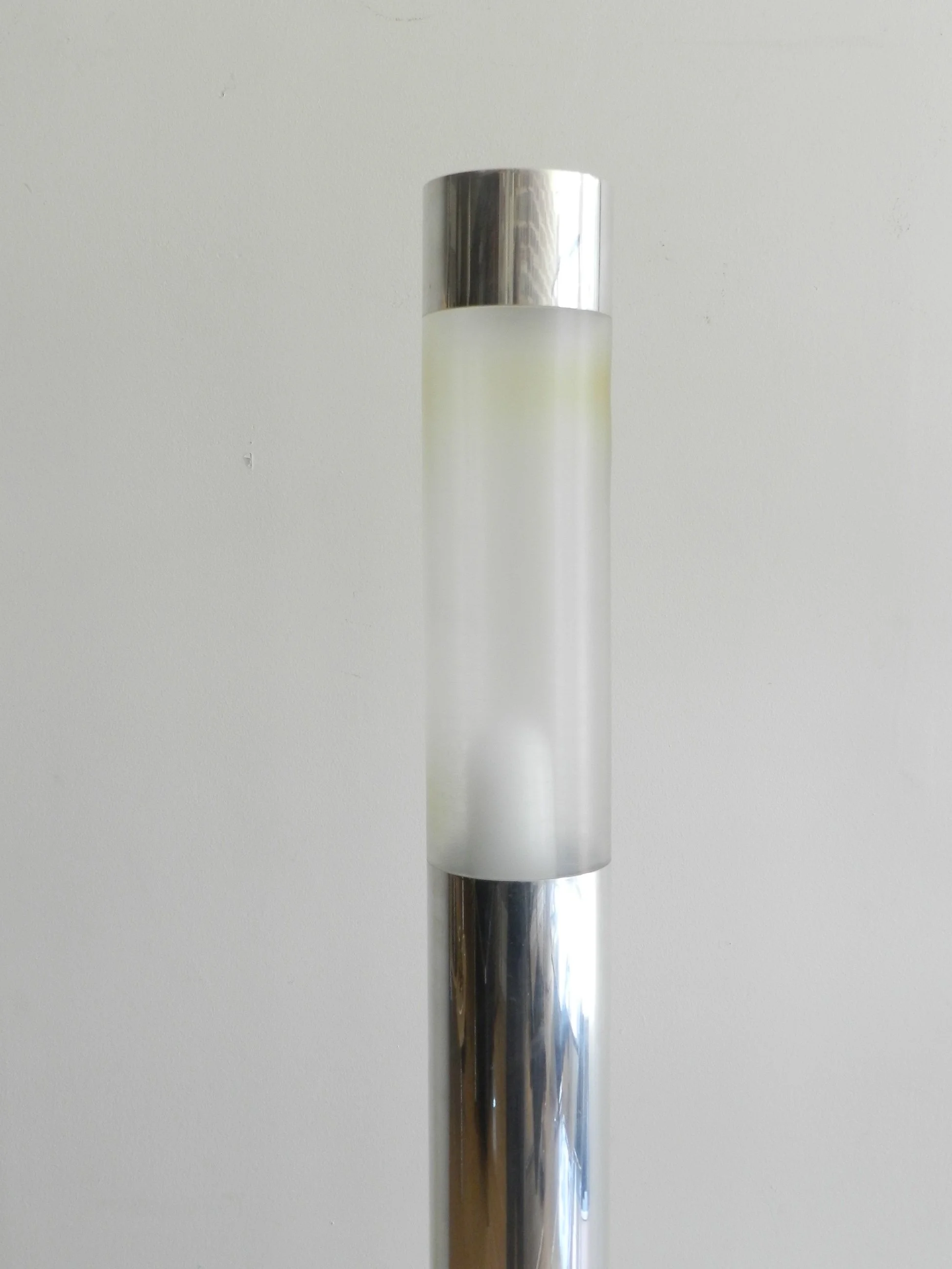 Modernist floor lamp designed by Gustavo Martinez for Origina. Polished aluminum, plastic shade on marble and acrylic.  Canada, 1970s.