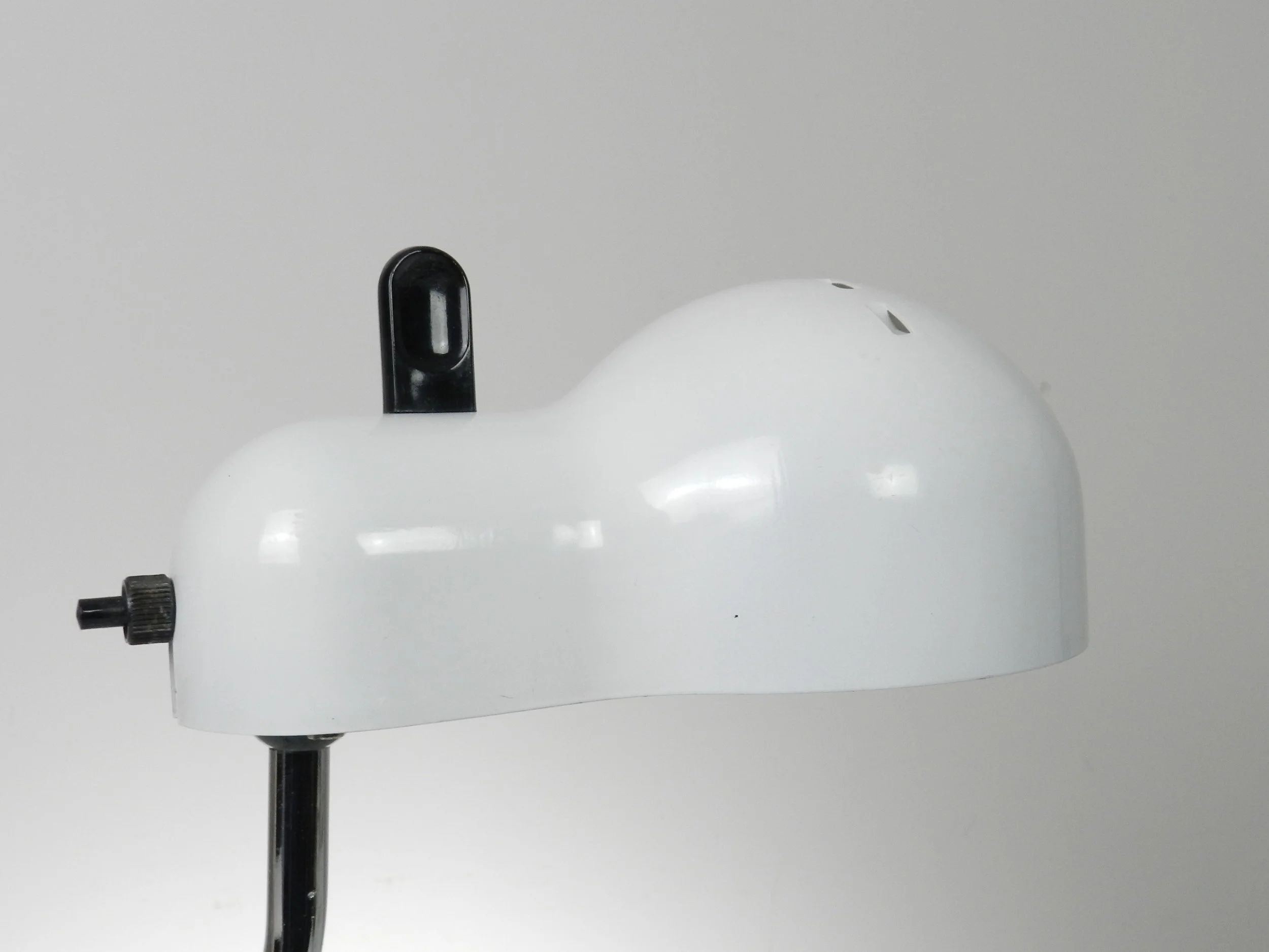 Minitopo table lamp designed by Joe Colombo for Stilnovo.  Italy, 1970s.