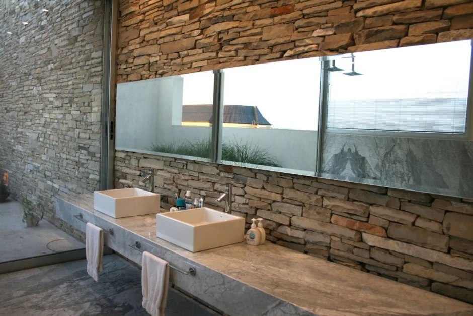 natural-bathroom-with-twin-sinks-in-stone.jpeg