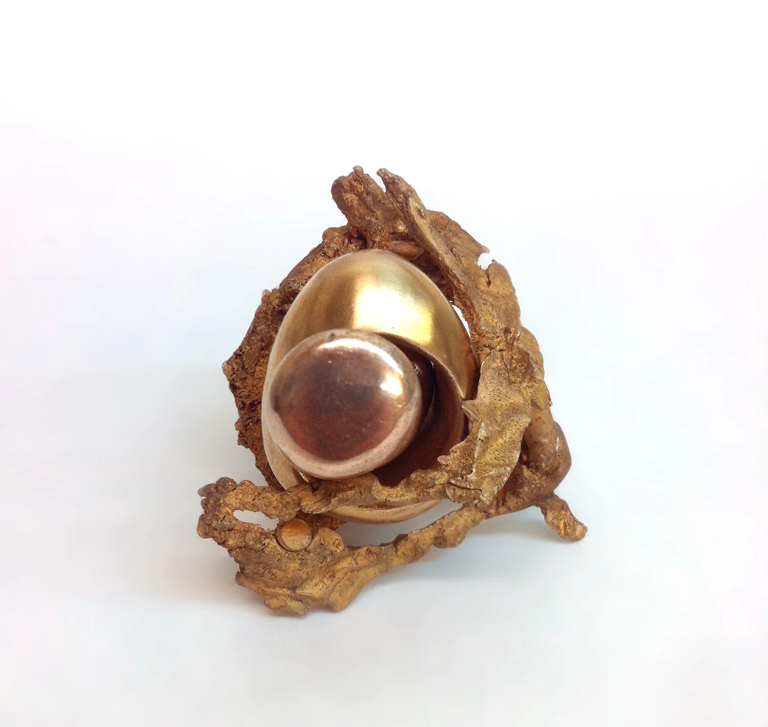 The Story of the Eye cast bronze, shibuichi Set of three interlocking rings.