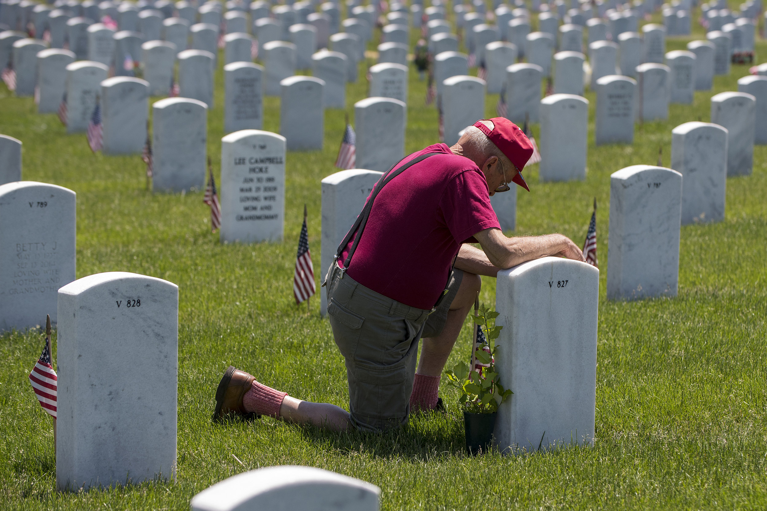  "You come to see your loved ones," Army veteran Nicholas Fotiadis of East Moline said after kneeling at the gravestone of his wife Mary Ann Fotiadis. "I think what [Memorial Day] is supposed to stand for is the important thing. … If you served, I th