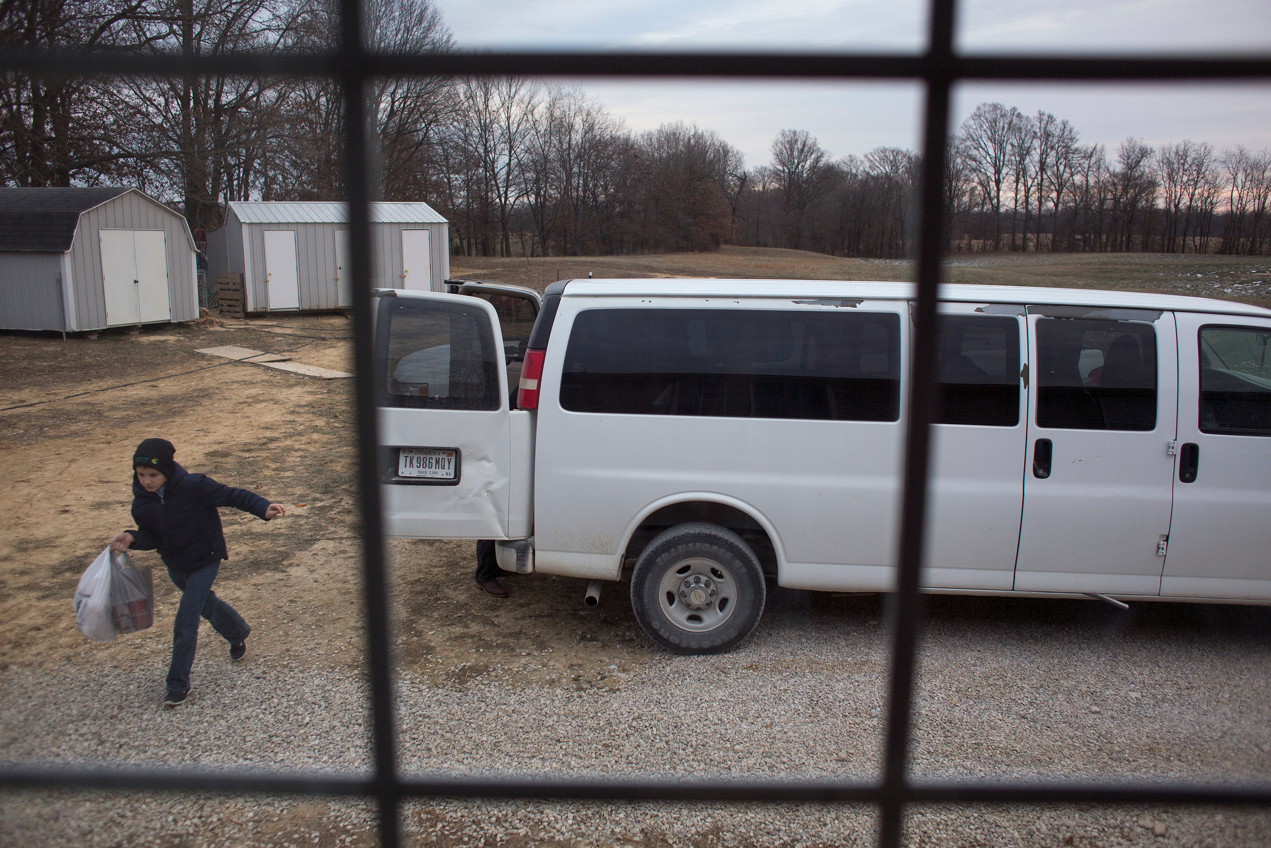     Darius helped carry goods into the Knepp home Dec. 30 after returning from a trip to Jasper with his father and siblings to shop and grab a bite to eat. The family makes the trip to Dubois County about twice a month to shop and also travels to th