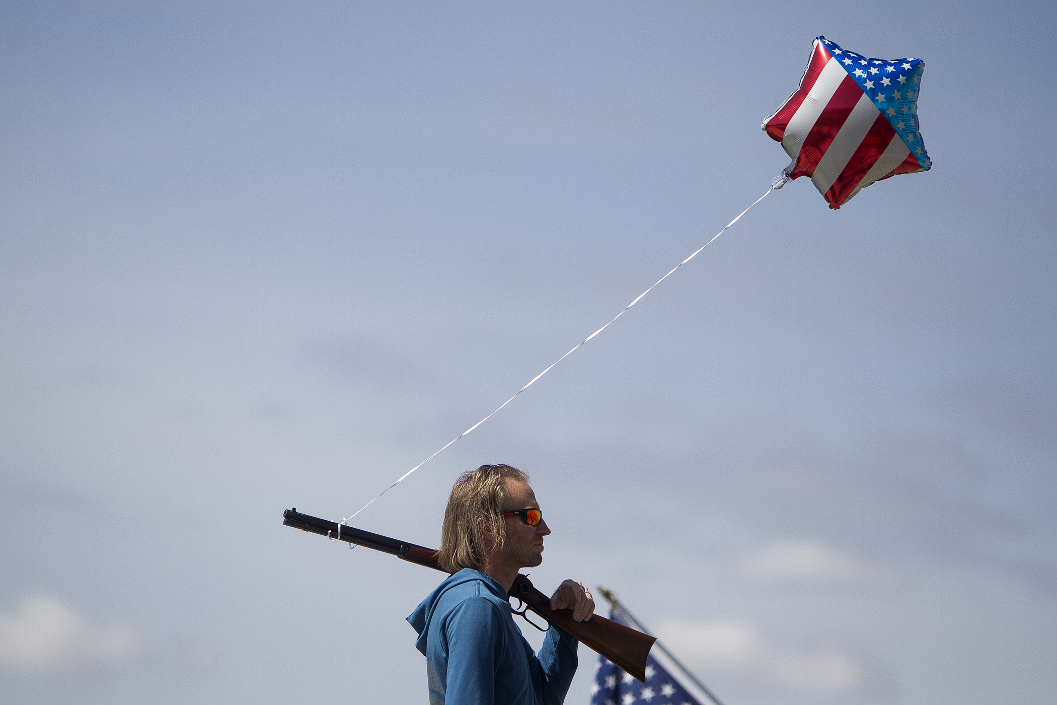 Jason Desmond, of Lehi, rests his Winchester rifle, given to him by his grandfather, on his shoulder while attending a pro-gun rally on the steps of the Utah State Capitol on April 14 in Salt Lake City. Desmond said he attended the event because he believes people need to come out to support what they believe in. “This is something I believe in,” Desmond said. “I’m not a huge gun nut, but I don’t like that the Second Amendment is under attack and getting all the attention that it is in the media.” At the protest, demonstrators heard from numerous speakers airing their anti-gun control beliefs. — April 14, 2018, Salt Lake City, Utah.