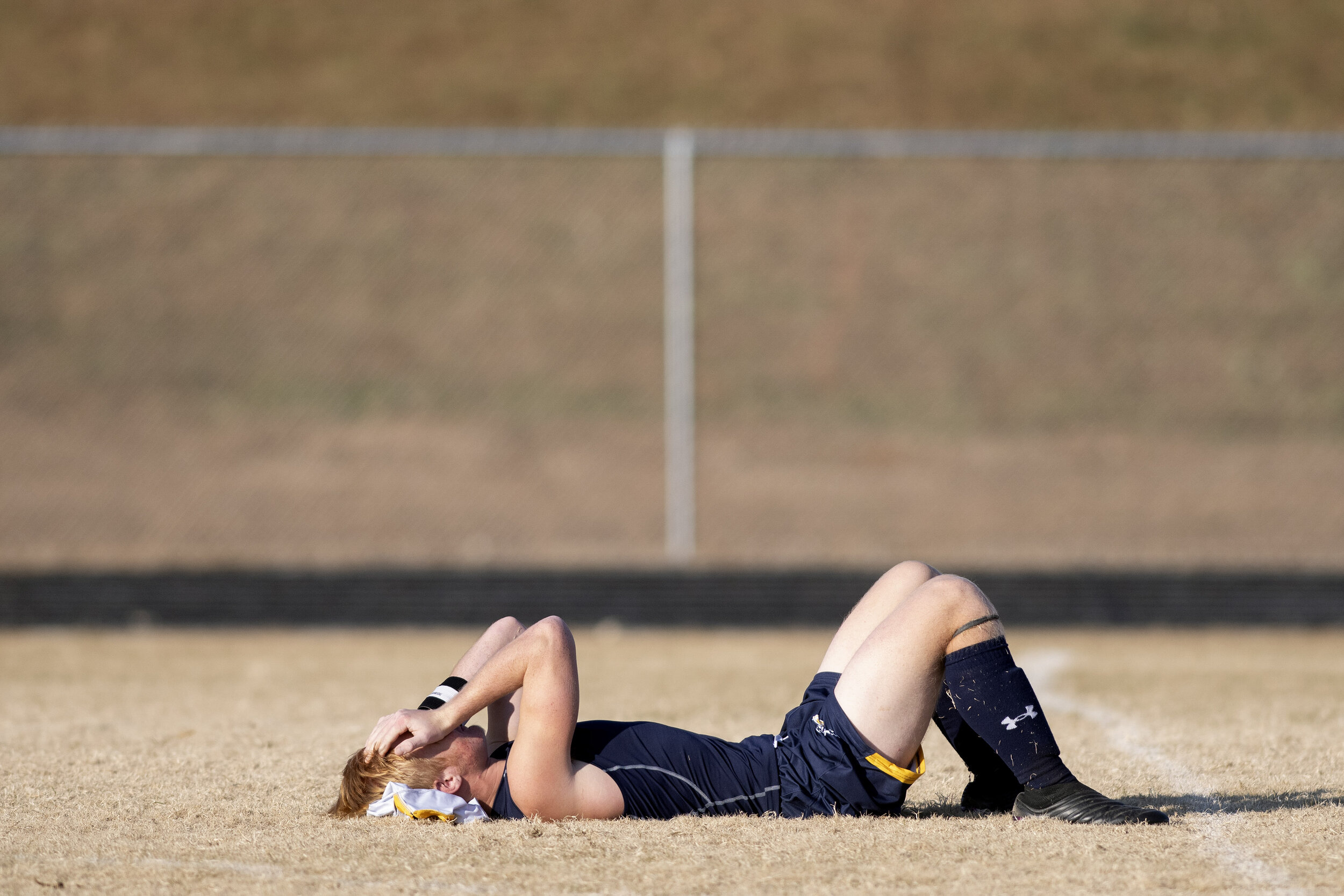  Saxony Lutheran's Quinn Steffens (17) takes a moment to himself on the field following the Saxony Lutheran Crusaders' 3-1 loss to Principia in the Class 1 sectional Nov. 16 at Saxony Lutheran High School in Jackson, Missouri.  