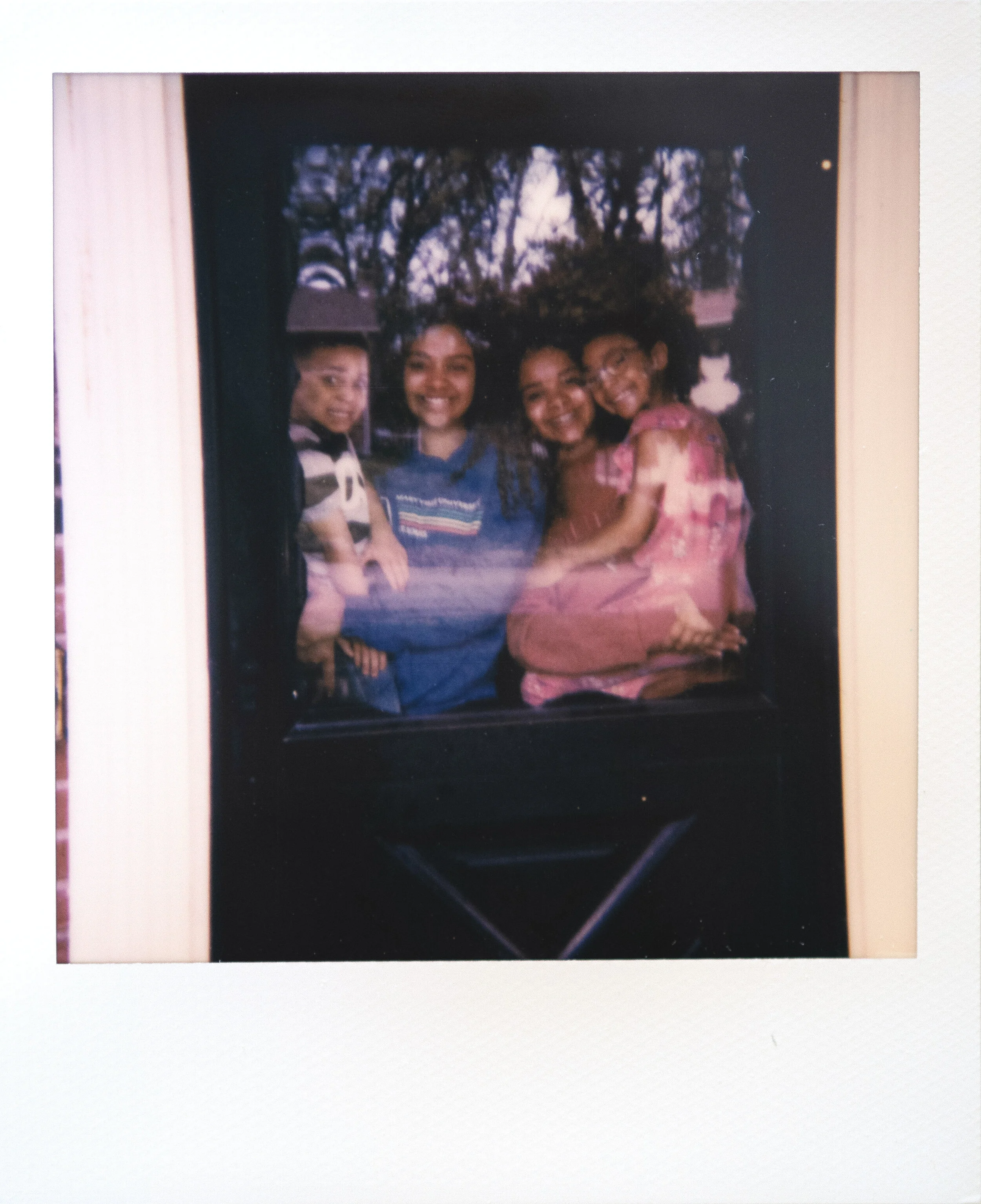  Siblings, from left, Asher Robinson, 3; Tiana Bowman; Talia Bowman, 15; and Bethani Robinson, 6; pose for a portrait Tuesday, April 7, 2020, at their Cape Girardeau home. Their mother Becki Robinson has been working from her Cape Girardeau home and 
