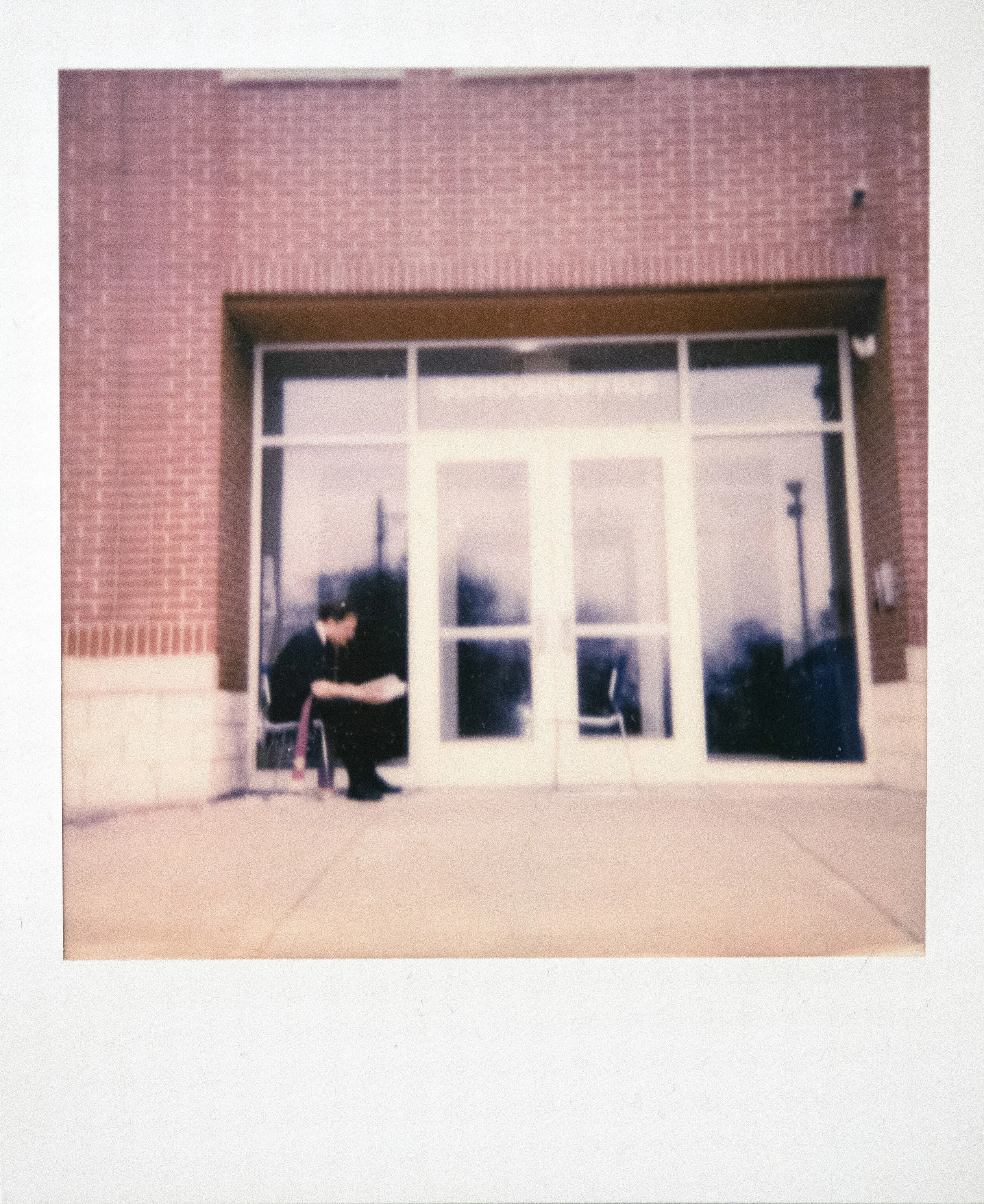  The Rev. Allan Saunders, pastor at St. Mary Cathedral, reads a book while available to hear confessions Saturday, March 28, 2020, outside St. Mary Cathedral School in Cape Girardeau. Saunders, who was scheduled to be available to hear confessions fr