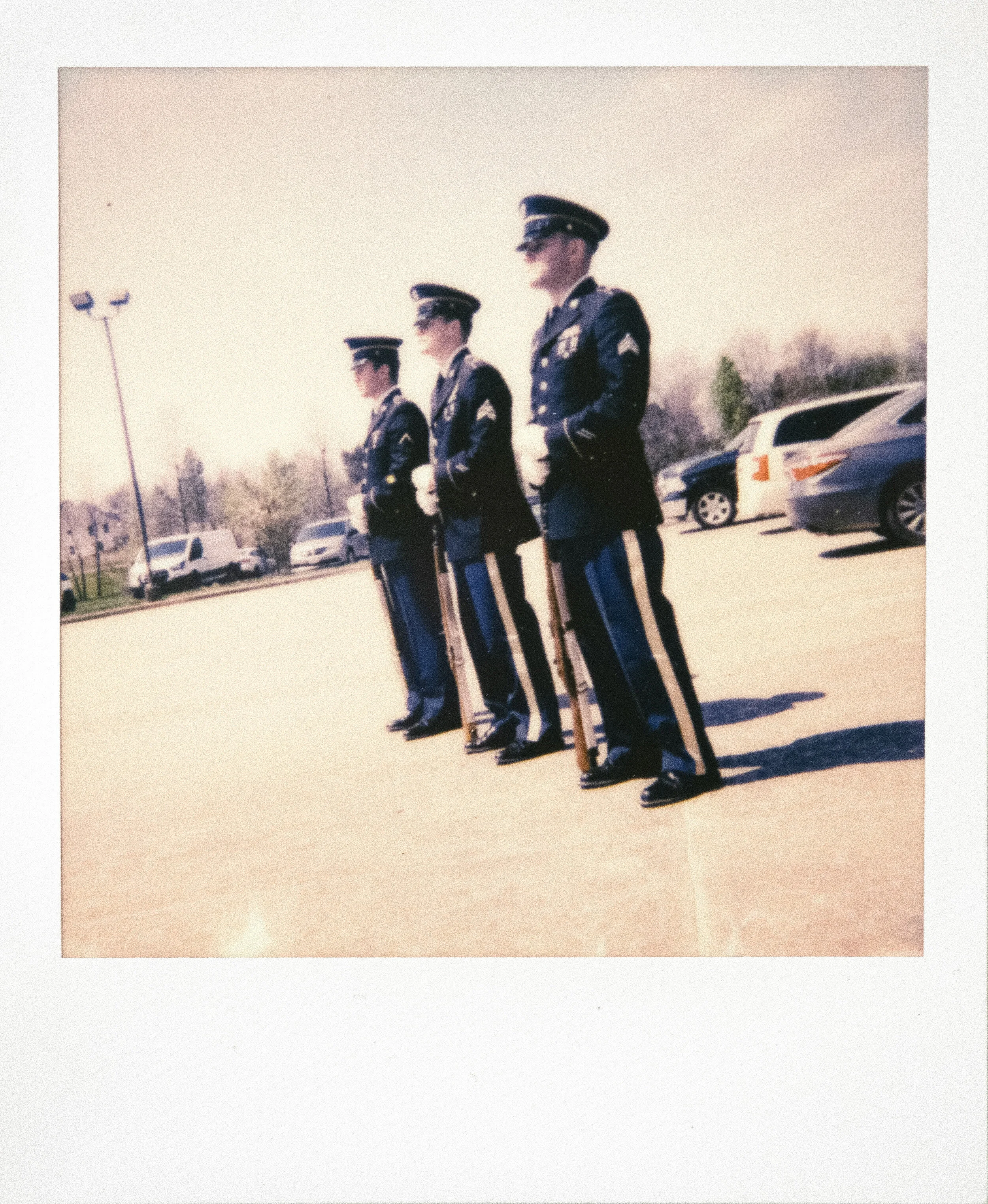  Members of the Missouri Army National Guard, from left, Conner Wakeland of St. Louis, Missouri, Kody Roy of Cape Girardeau and Dylan Hovis of Bloomfield, Missouri, stand while performing military honors for the late World War II veteran Clifford Hei
