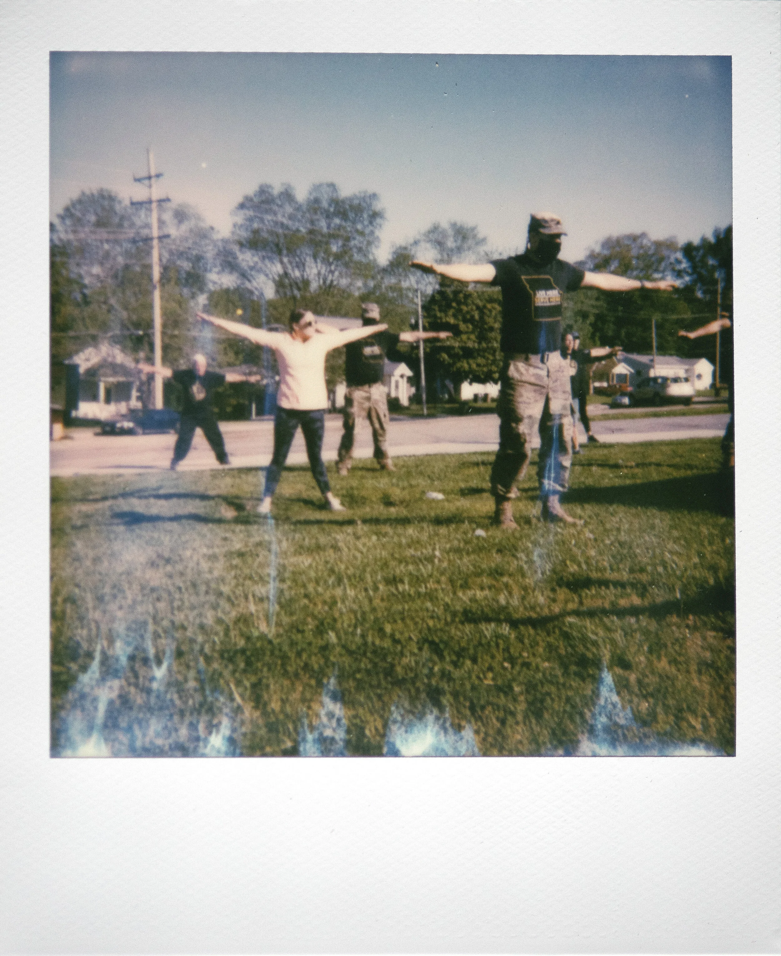  Missouri National Guard member Jerod Burch, foreground right, and STREAM specialist Kelley Branch, foreground left, workout with other members of the Missouri National Guard and Jefferson Elementary School teachers and staff Thursday, May 7, 2020, a