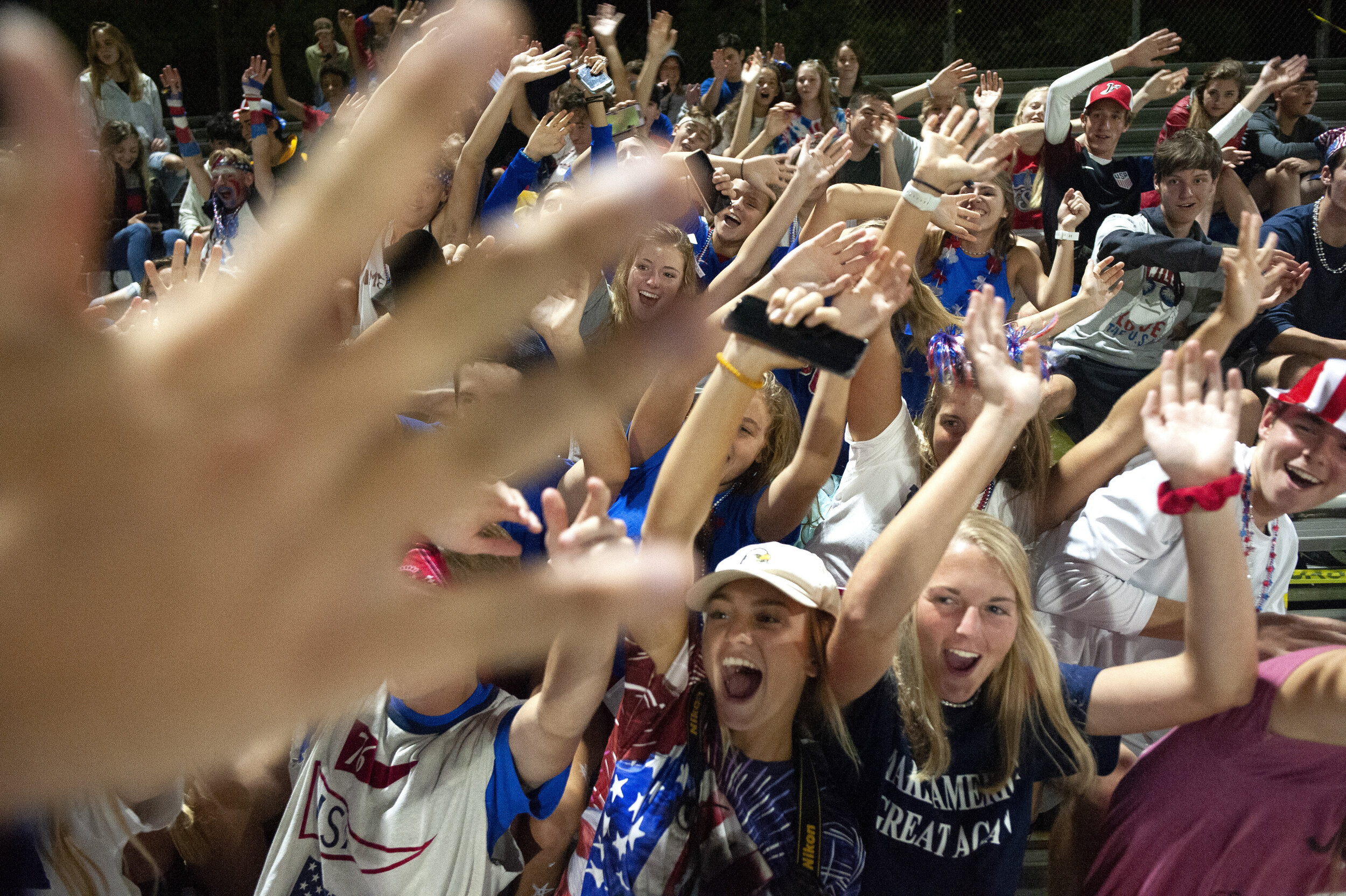  Jackson seniors Alice Mansell, front middle in hat, and Ashlyn Prince, front right, do the "roller coaster" with other Jackson fans at halftime of the Jackson Indians' matchup against the Sikeston Bulldogs on Friday, Sept. 20, 2019, in Jackson. Jack