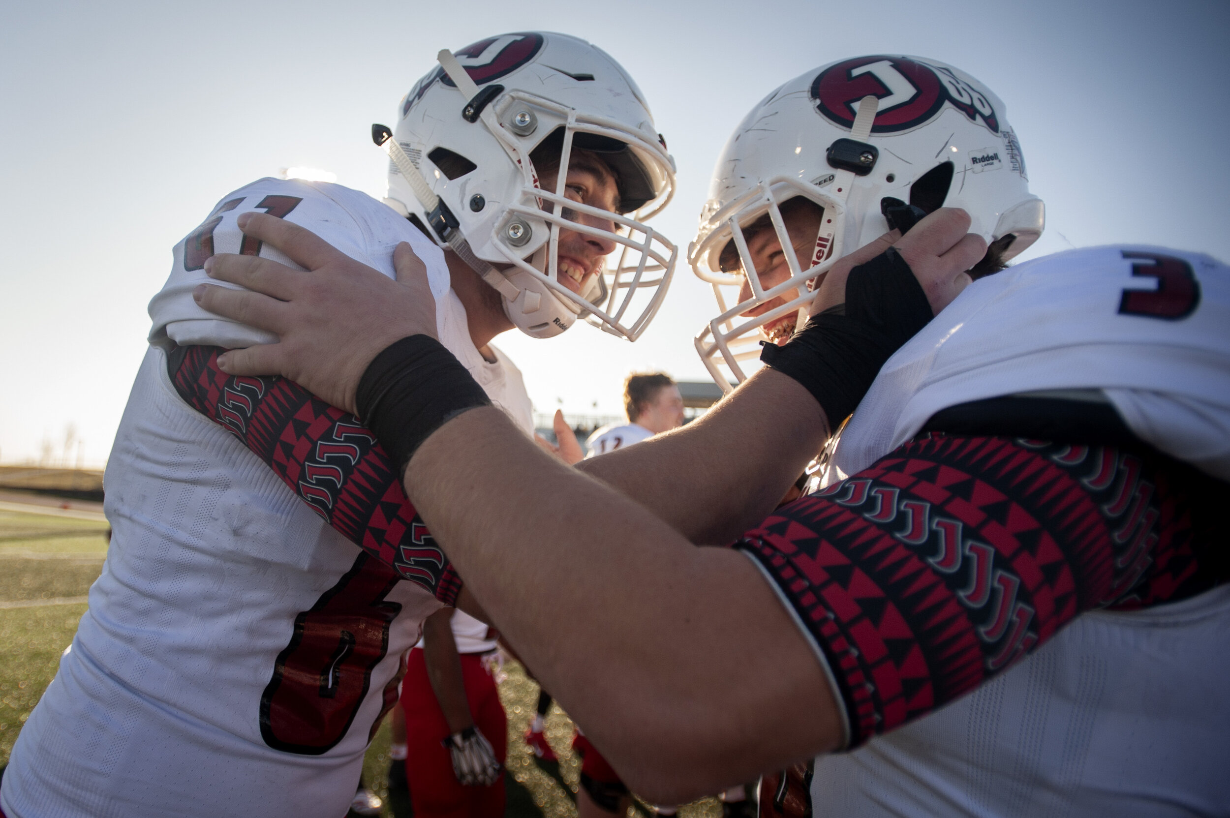  Jackson's Bret Meyer (67) and JR Place (36) celebrate the Indians' 20-7 victory over Staley High School in the MSHSAA Class 5 state semifinals Saturday, Nov. 30, 2019, in Kansas City, Missouri.  