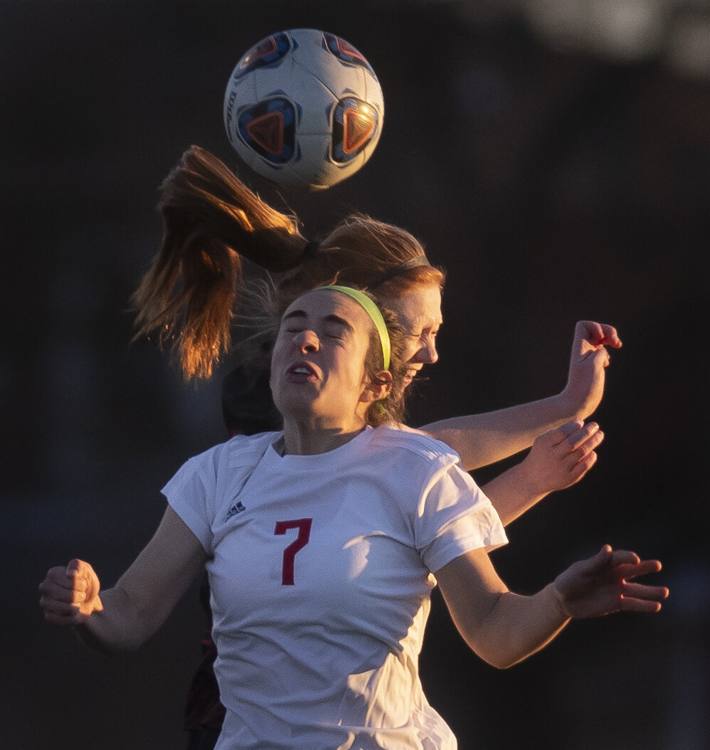  Parkway South's Maria Alexopoulos (7) and Jackson's Grace Crowden (3) go up for the ball during Jackson's 2-0 victory against Parkway South during the Indians' season and home opener March 15 in Jackson, Missouri.  