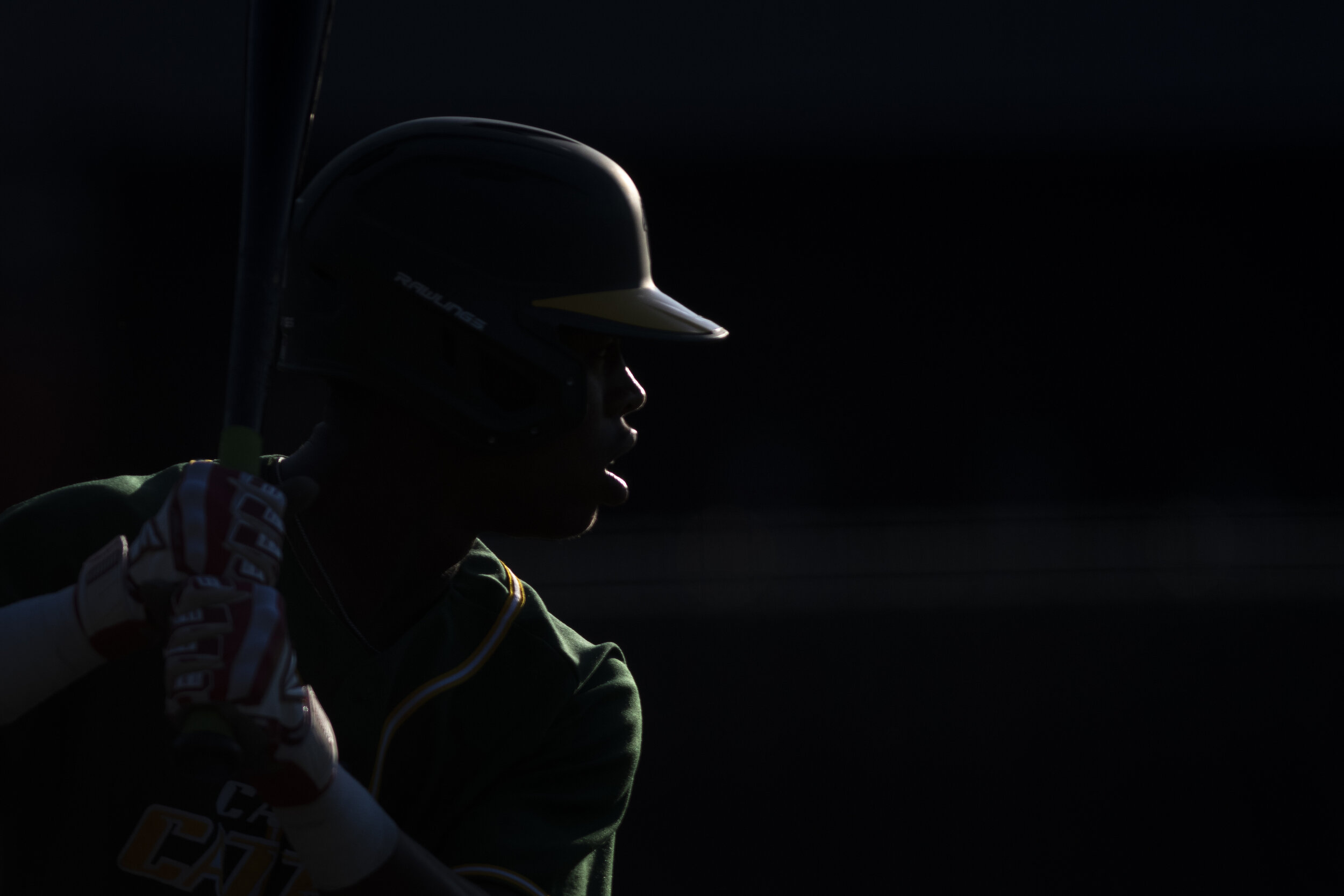  Cape Catfish outfielder Curtis Washington Jr. (26) stands at bat during the first game of a doubleheader between the Cape Catfish and the Hannibal Hoots on July 30 at Capaha Field in Cape Girardeau, Missouri. The Catfish won the first game 2-0. 