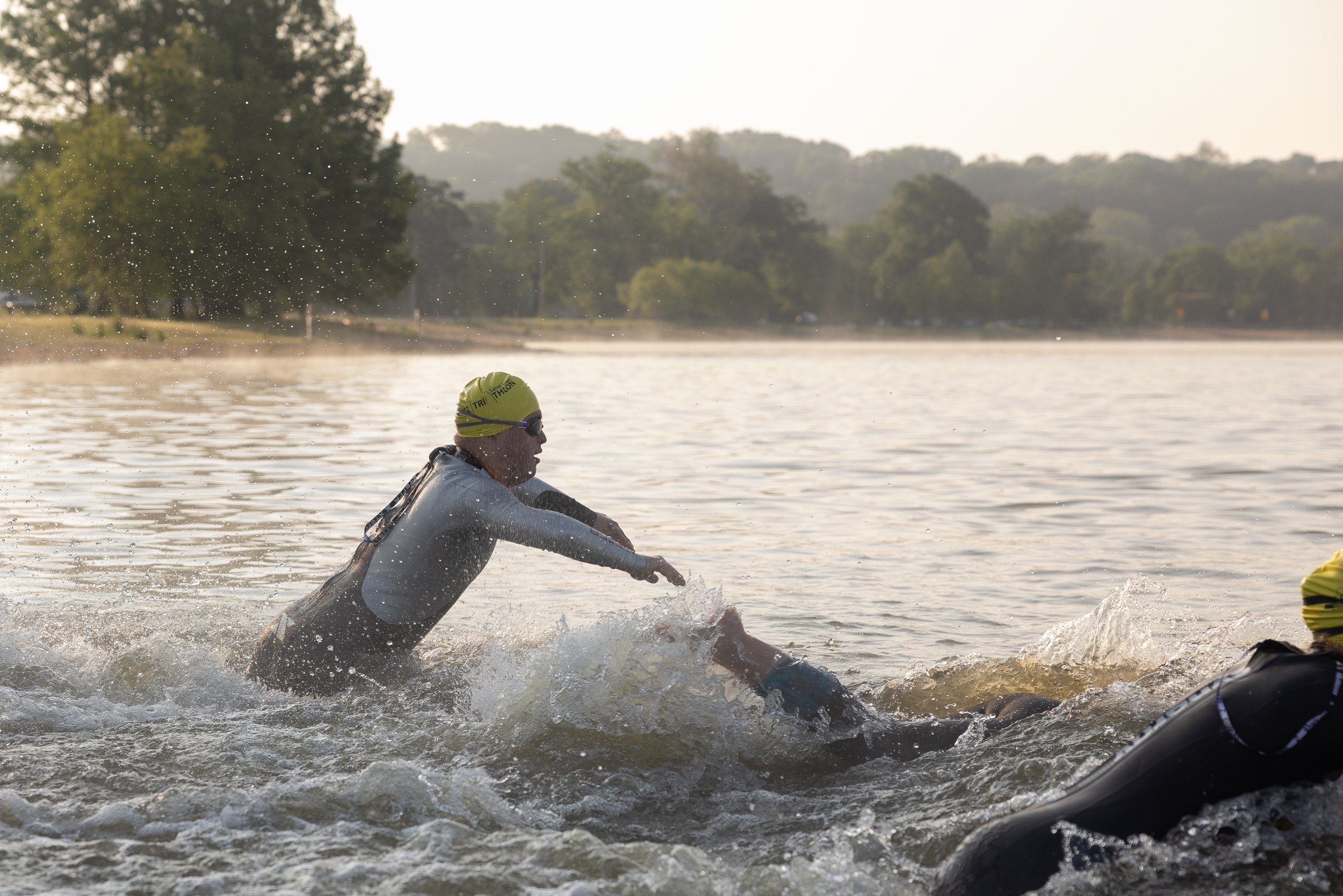  Gabriel Cobb dove into Creve Coeur Lake at the start of his second triathlon of the year May 21 at Creve Coeur Lake in Maryland Heights, Missouri. The 22-year-old triathlete, who also has Down syndrome, has competed in 13 of the athletic events that