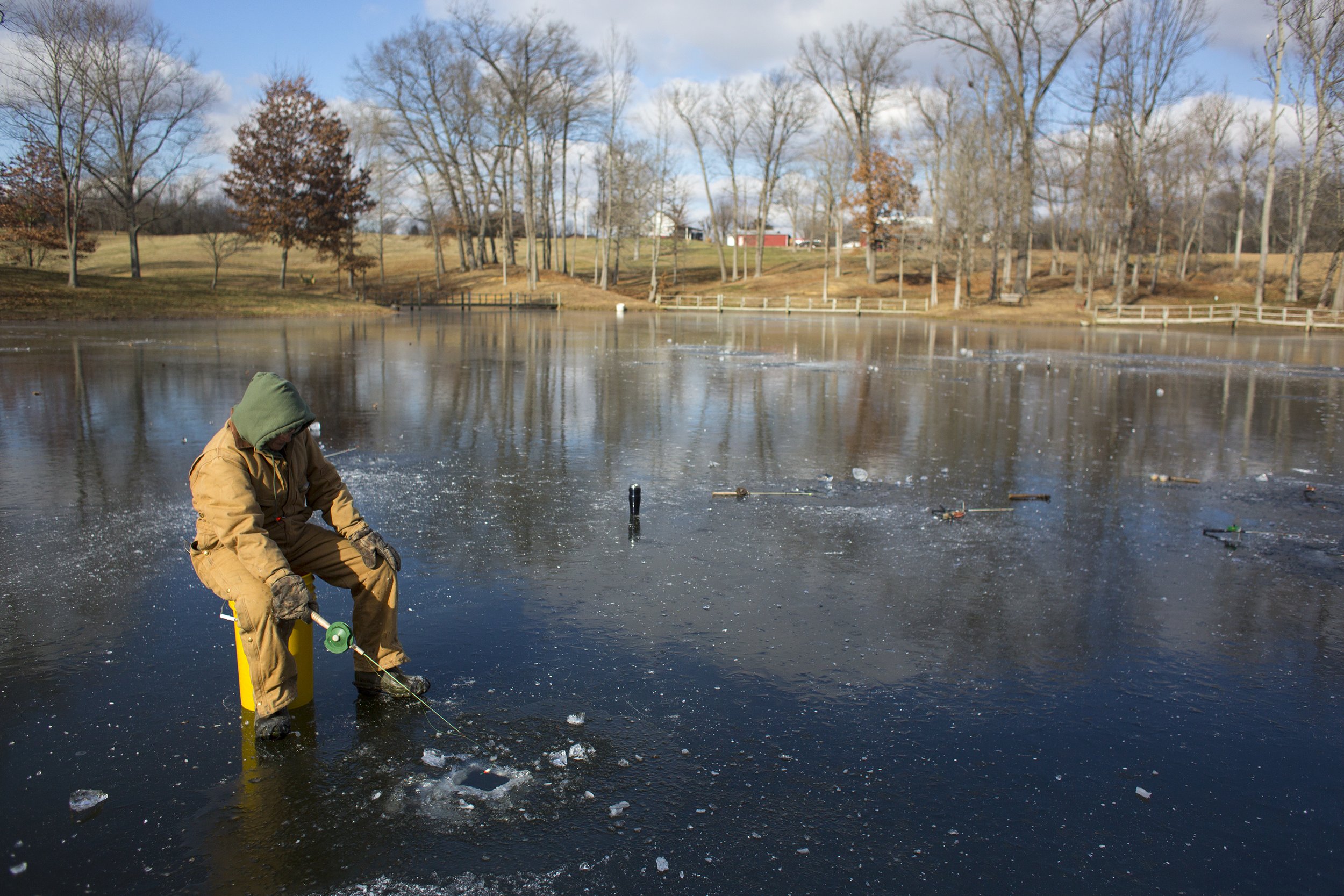  “I don’t care if it’s cold, hot, whatever. I like catching fish,” Sherry Buschkoetter said while making use of the cold weather to do some New Year’s Eve ice fishing Dec. 31 on the pond behind her Jasper home in Indiana. She said the fish taste much