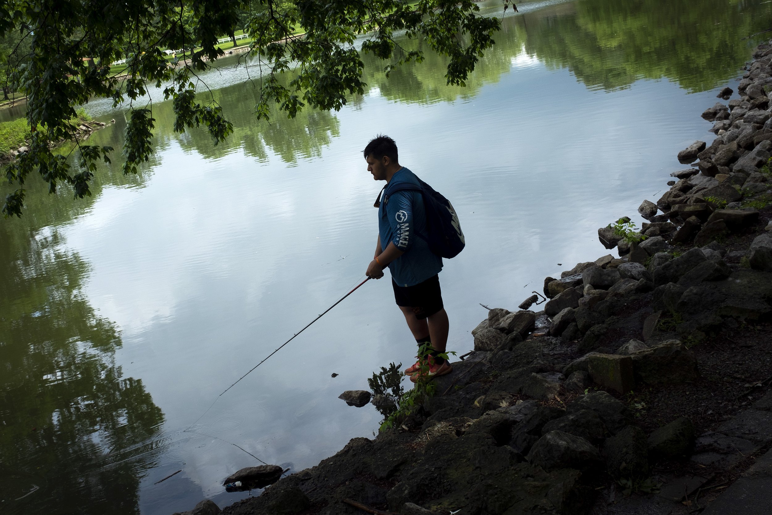  Tanner Mendoza, 17, of Cape Girardeau goes fishing May 27 at Capaha Park in Cape Girardeau. Mendoza said he tries to go fishing every day. "It's one of my favorite hobbies, that and football," Mendoza said. He said fishing is a stress reliever for h