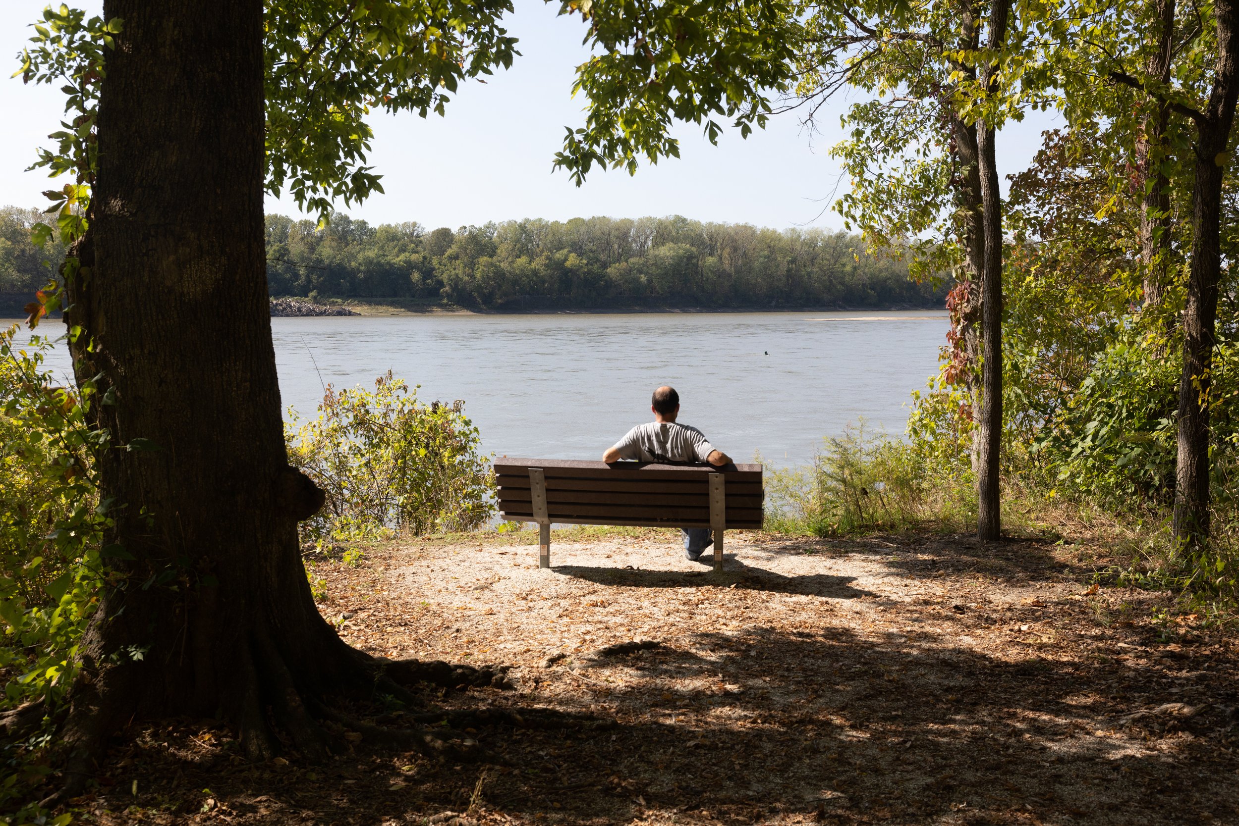 Brandon Pals, a parishioner at St. Mary’s Assumption in St. Louis, sat at a bench overlooking the Missouri River during a Katy Trail Marian Pilgrimage on Oct. 11 along the Katy Trail in Warren County, Missouri.  
