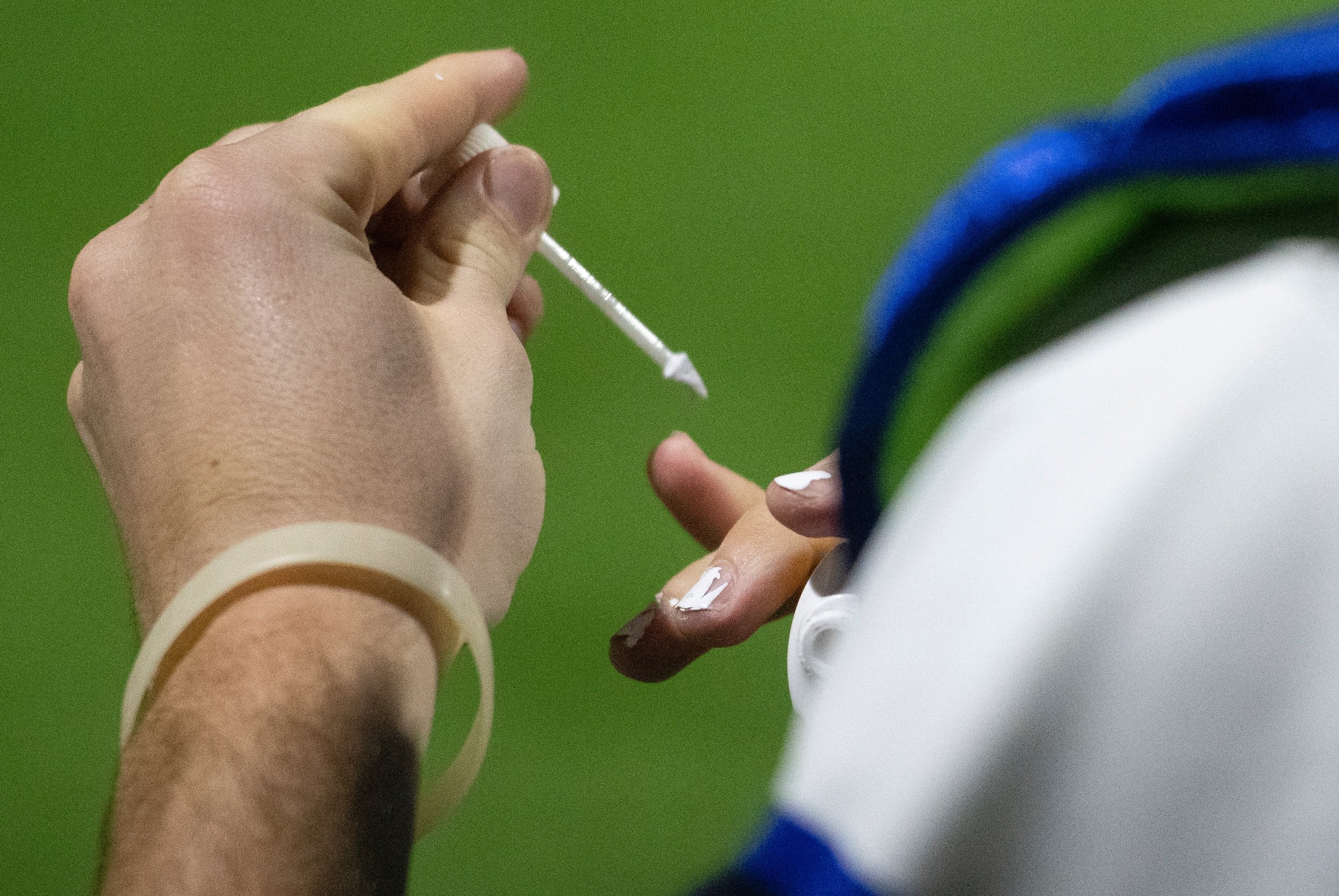  Notre Dame catcher Gabe Hurley (12) applies BIC Wite-Out to his fingers during the Notre Dame Bulldogs' 4-1 win over the Jackson Indians in the SEMO Conference championship April 29 at Capaha Field in Cape Girardeau, Missouri. 