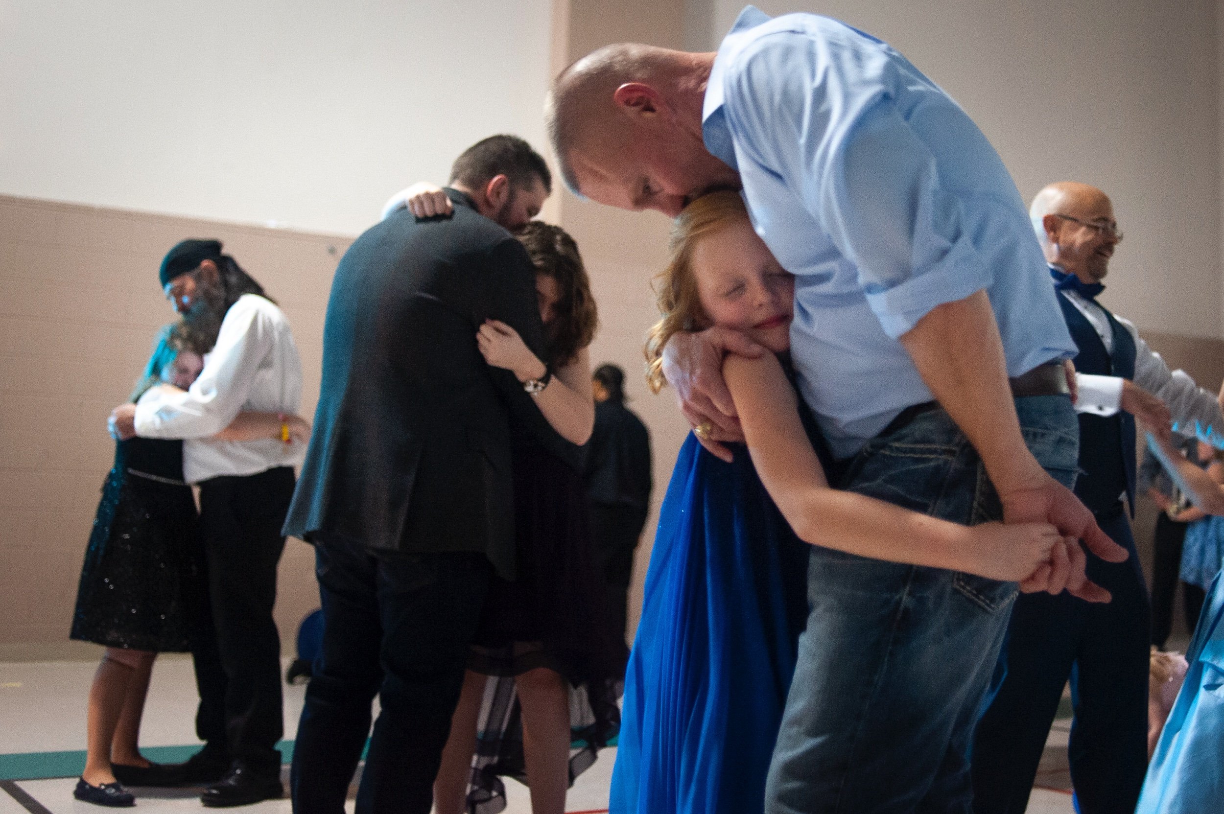 Joda Grace Bess, 7, of Cape Girardeau, receives a kiss from her father David Bess while dancing during the 11th annual Father Daughter Dance on Feb. 16 at the Osage Centre in Cape Girardeau, Missouri. "It's always a really good time," David said abo
