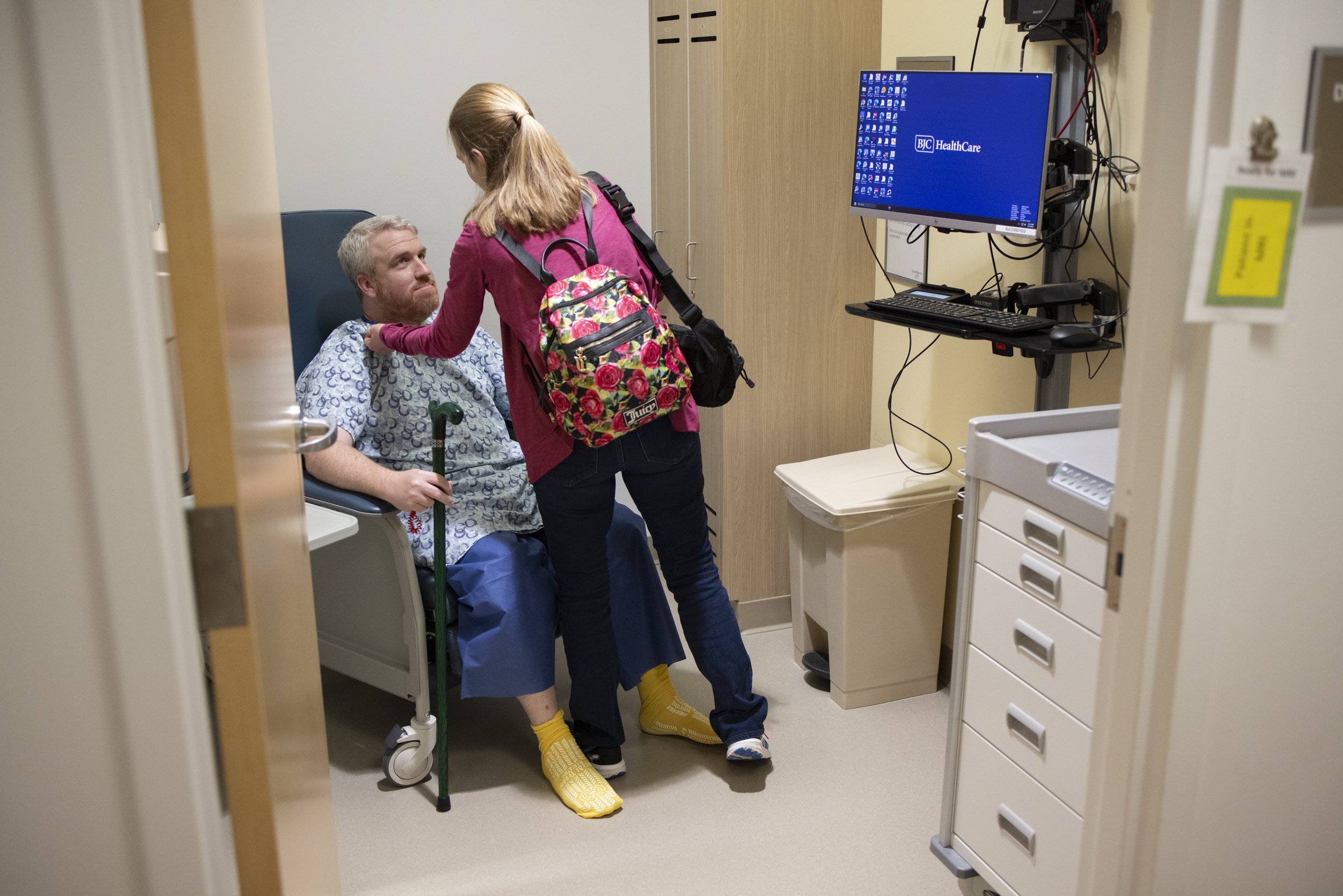 Adam looked at his wife, Beth, before an MRI concerning a mass on his brain March 14 at the Center for Advanced Medicine - South County in South St. Louis County. Adam, a parishioner at St. Lucy Parish and host of “Roadmap to Heaven” on Covenant Net