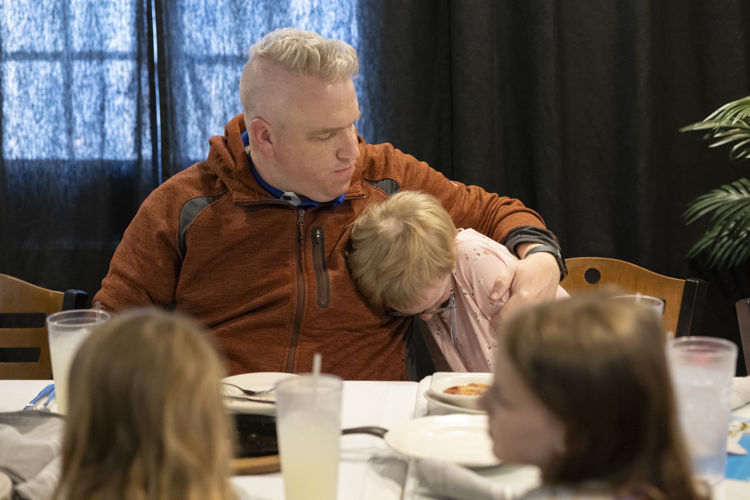 Adam embraced his daughter Amelia, 11, at a family dinner the evening before his brain surgery April 15 at Ari's Restaurant & Bar in St. Louis. “The most repeated phrase in all of the scriptures is, ‘don’t be afraid,’” Adam said. “You see the ev
