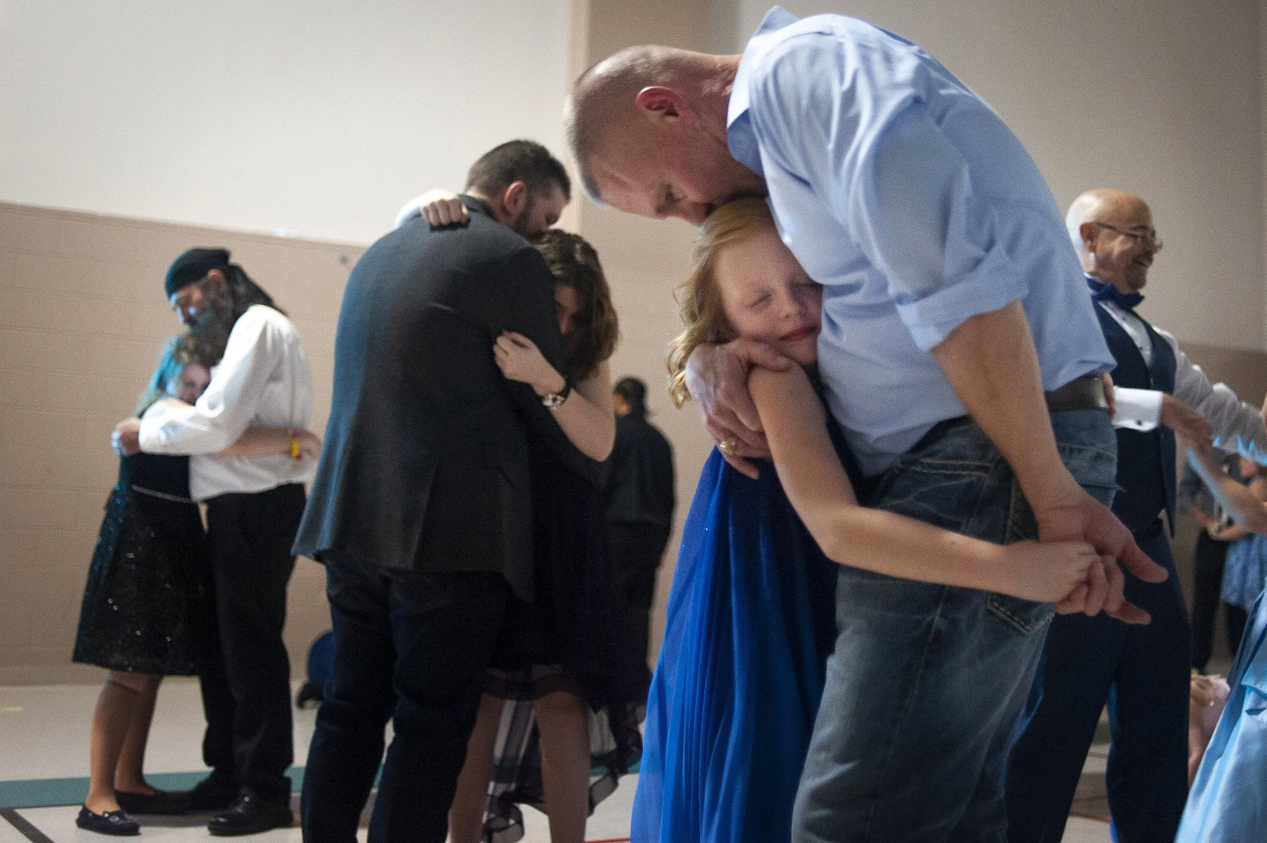  Joda Grace Bess, 7, of Cape Girardeau, receives a kiss from her father David Bess while dancing during the 11th annual Father Daughter Dance on Feb. 16 at the Osage Centre in Cape Girardeau, Missouri. "It's always a really good time," David said abo