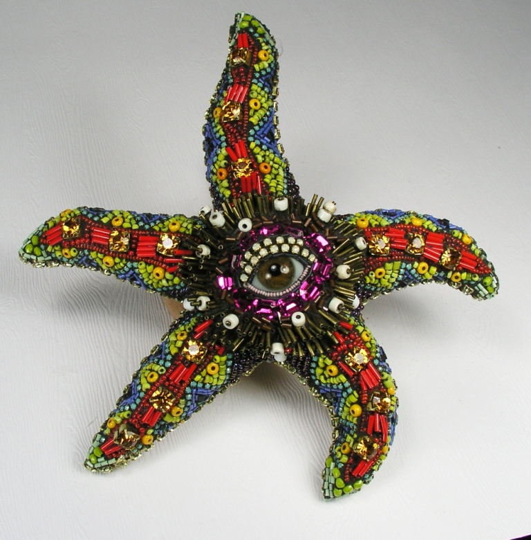 STARFISH, vintage glass , African seed beads, brass tube bead, 6 3/4 x 7 x 1 1/4 inches