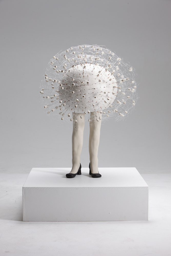 Seedy Woman, 2014, vitreous china, milk paint, stainless steel, copper, monofilament, resin, 4 x 2.5 x 2.5 in.