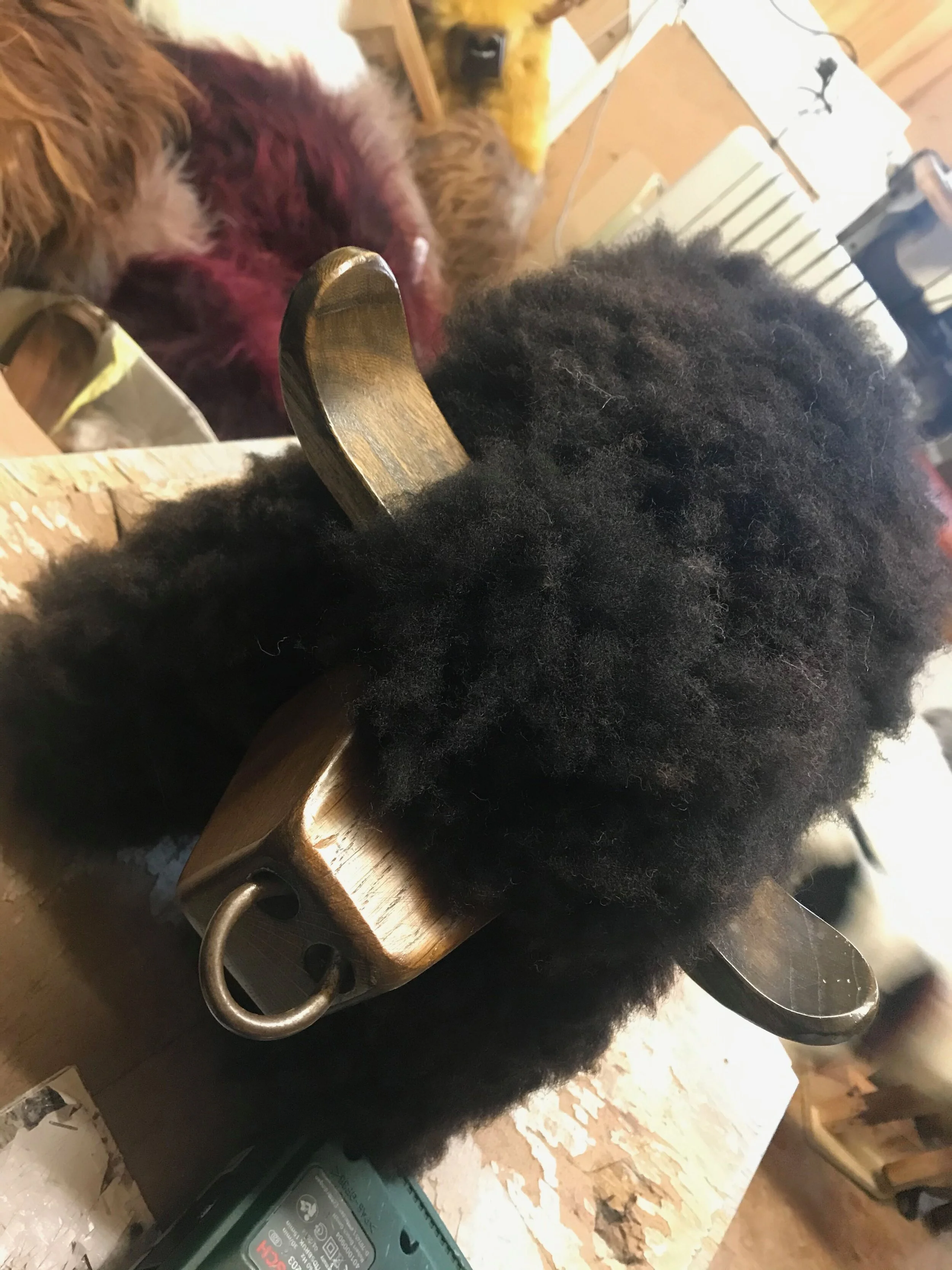 Quirky angle as he dances in the workshop