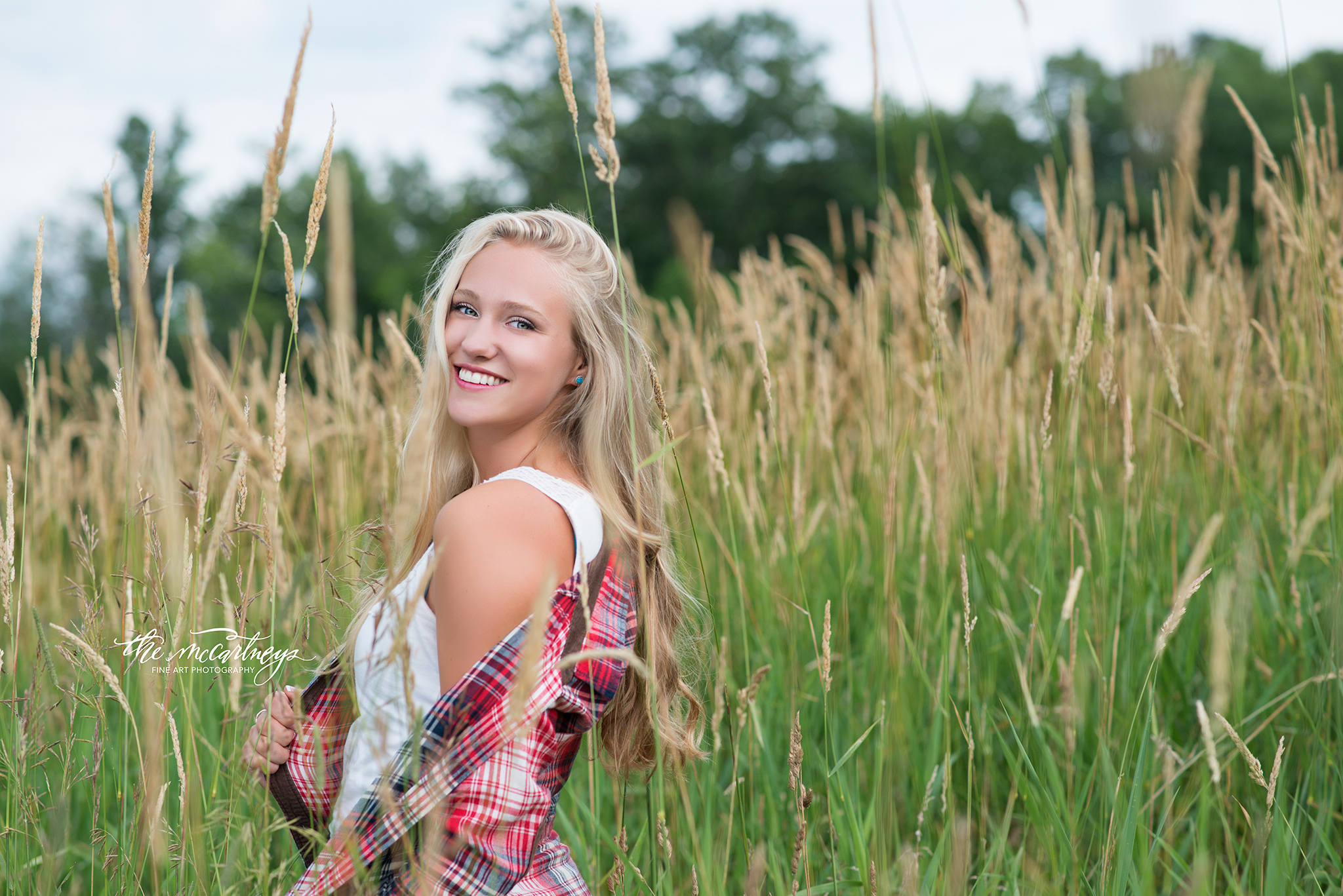 "Working with the McCartneys for just two hours in my session motivated me for the next few weeks because of their inspiring attitude, excitement, encouragement, positivity, and fun energy. Not only was it a great experience working with them, but the pictures Kelsy and Butch produced amazed me! They captured my personality better than I ever could imagine, all while having clean and classic photos and videos. If booking with the McCartneys, you receive beautiful images, but also cherished memories to last a lifetime, just like I cherish mine." -Sophie Kamke, Mosinee High, Class of 2018 " We loved every minute of our session with the McCartneys! When we started, a cute little dog named Parker greeted us and Butch and Kelsey welcomed us with genuine hugs. My daughter was nervous when we began and they totally made her feel comfortable and her photo shoot ended up just awesome. We had a very difficult time picking favorites and they were totally patient with us in making decisions. I would highly recommend the McCartneys!" -Dana Kamke, Sophie Kamke's Mom :)