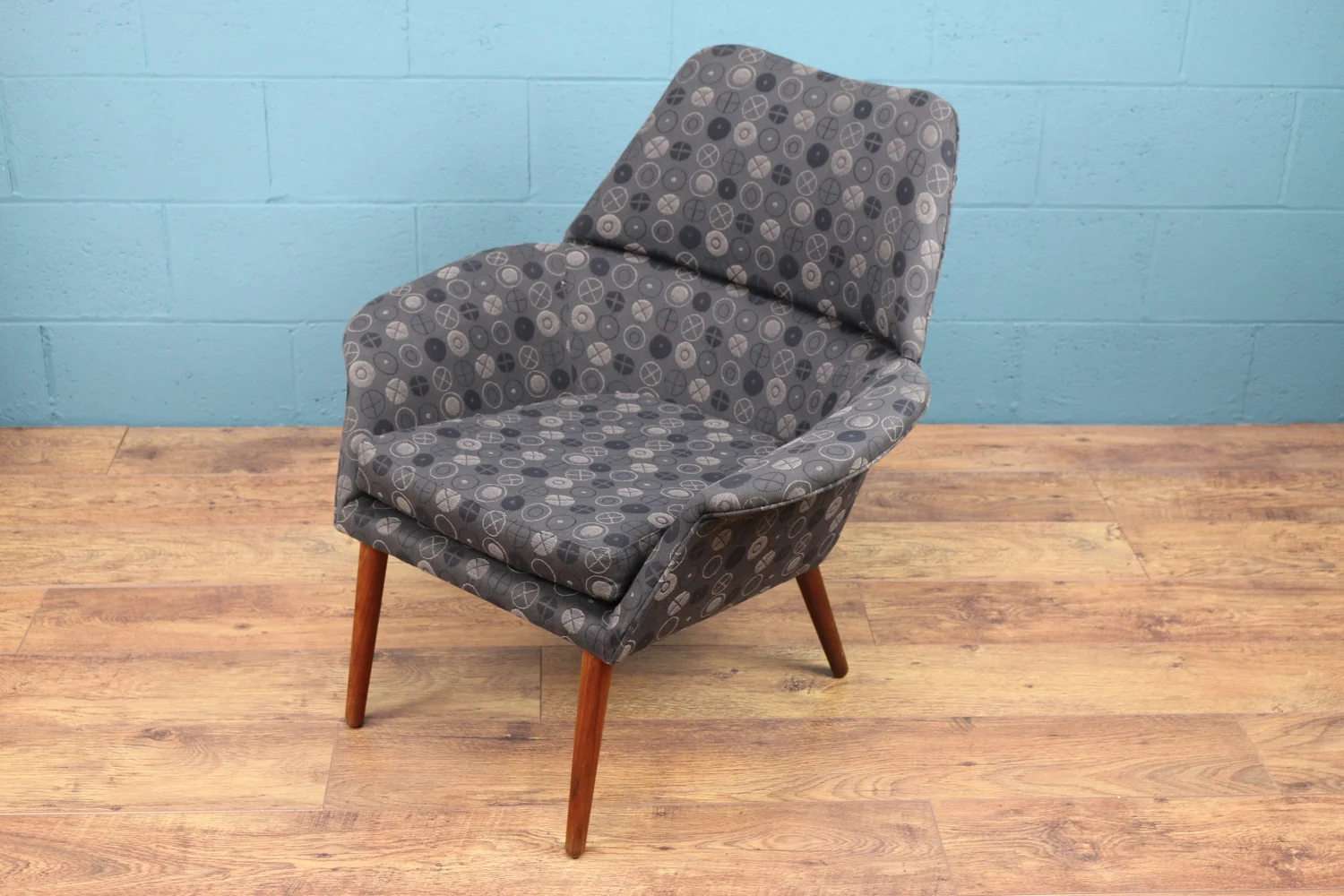 Mid century Danish armchair upholstered in George Nelson textile.